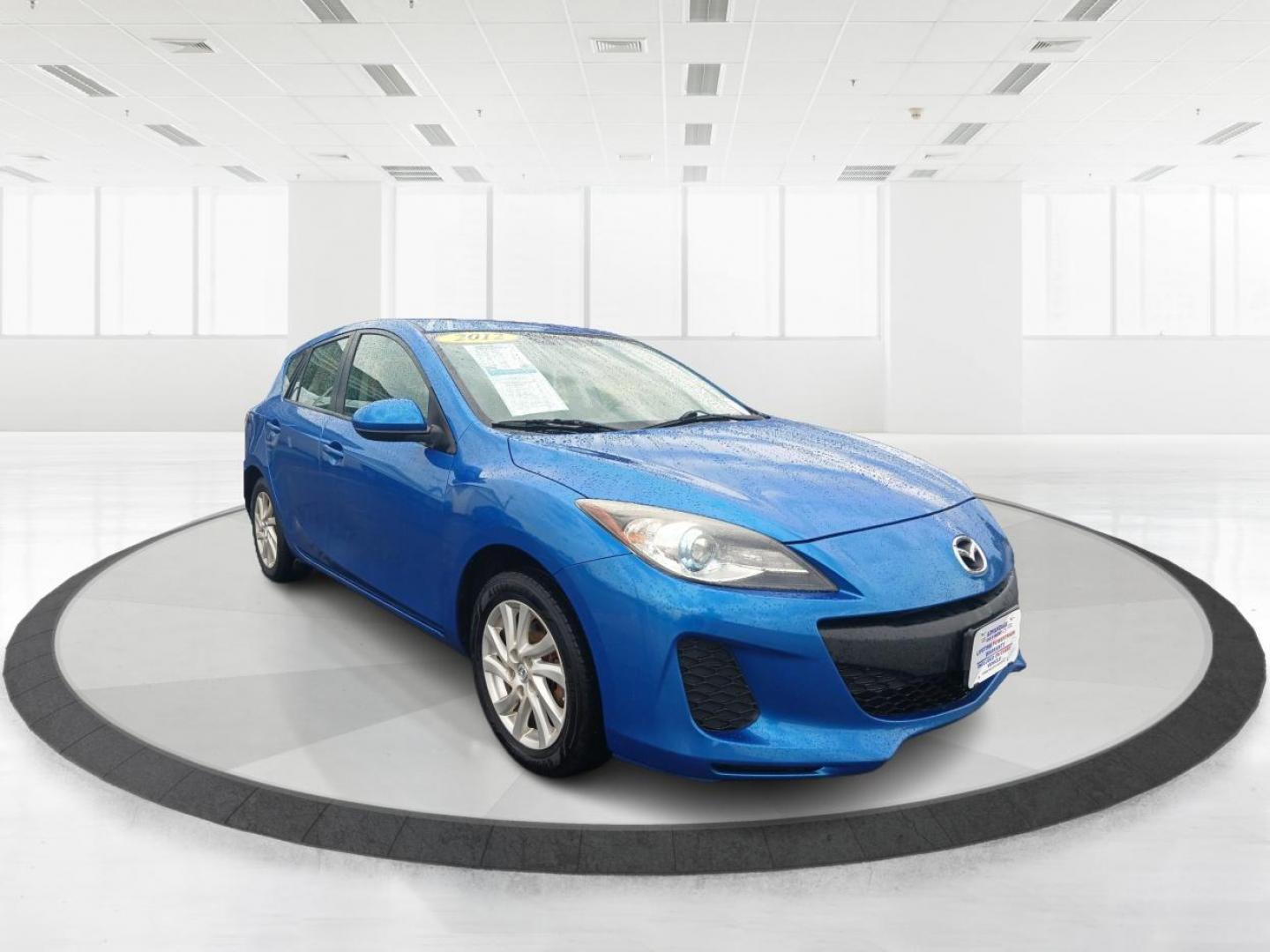 2012 Sky Blue Mica Mazda MAZDA3 I Grand Touring 5-Door (JM1BL1M72C1) with an 2.0L L4 DOHC 16V engine, located at 401 Woodman Dr, Riverside, OH, 45431, (937) 908-9800, 39.760899, -84.123421 - Photo#0