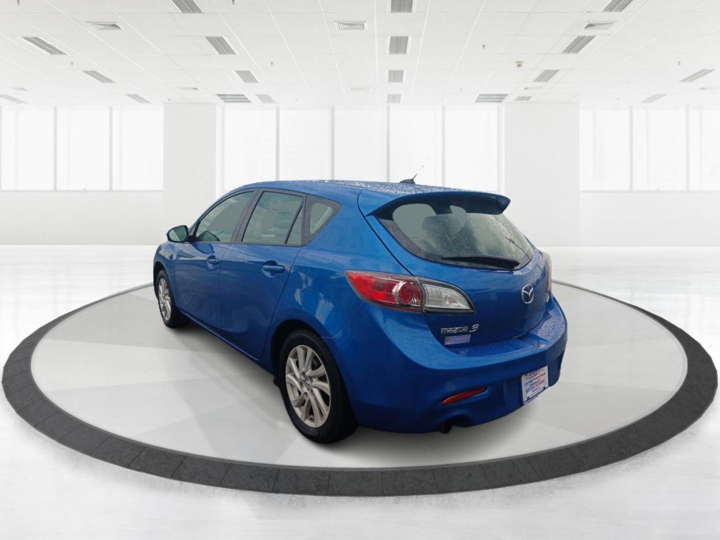 2012 Sky Blue Mica Mazda MAZDA3 I Grand Touring 5-Door (JM1BL1M72C1) with an 2.0L L4 DOHC 16V engine, located at 401 Woodman Dr, Riverside, OH, 45431, (937) 908-9800, 39.760899, -84.123421 - Photo#4