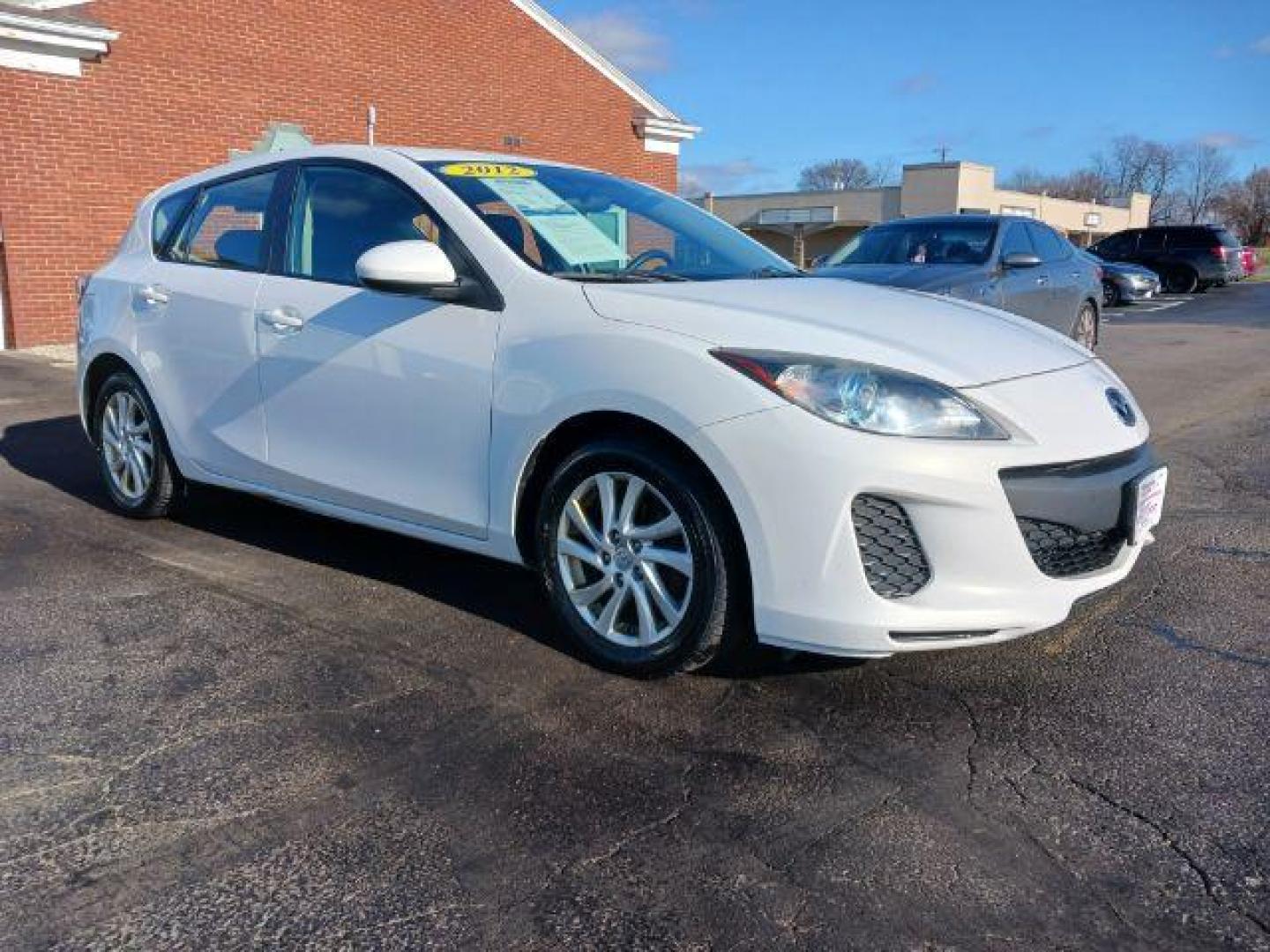 2012 Crystal White Pearl Mica Mazda MAZDA3 I Grand Touring 5-Door (JM1BL1M79C1) with an 2.0L L4 DOHC 16V engine, located at 1951 S Dayton Lakeview Rd., New Carlisle, OH, 45344, (937) 908-9800, 39.890999, -84.050255 - Photo#0