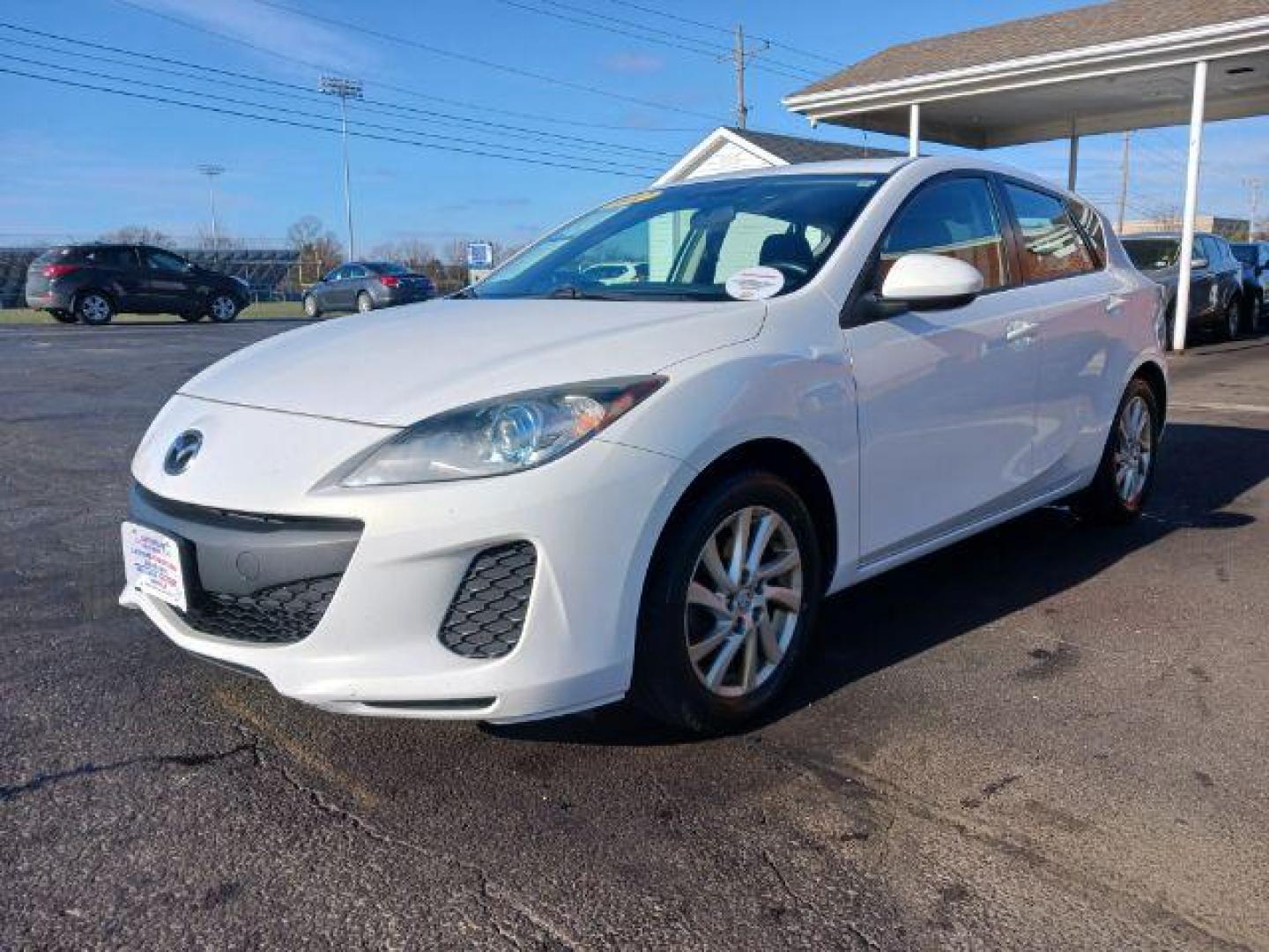 2012 Crystal White Pearl Mica Mazda MAZDA3 I Grand Touring 5-Door (JM1BL1M79C1) with an 2.0L L4 DOHC 16V engine, located at 1951 S Dayton Lakeview Rd., New Carlisle, OH, 45344, (937) 908-9800, 39.890999, -84.050255 - Photo#2