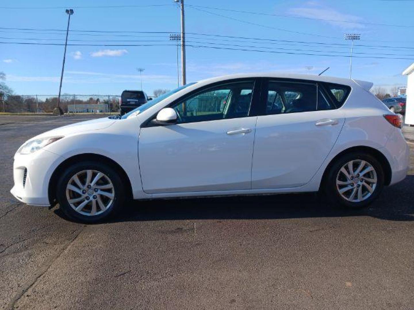 2012 Crystal White Pearl Mica Mazda MAZDA3 I Grand Touring 5-Door (JM1BL1M79C1) with an 2.0L L4 DOHC 16V engine, located at 1951 S Dayton Lakeview Rd., New Carlisle, OH, 45344, (937) 908-9800, 39.890999, -84.050255 - Photo#3