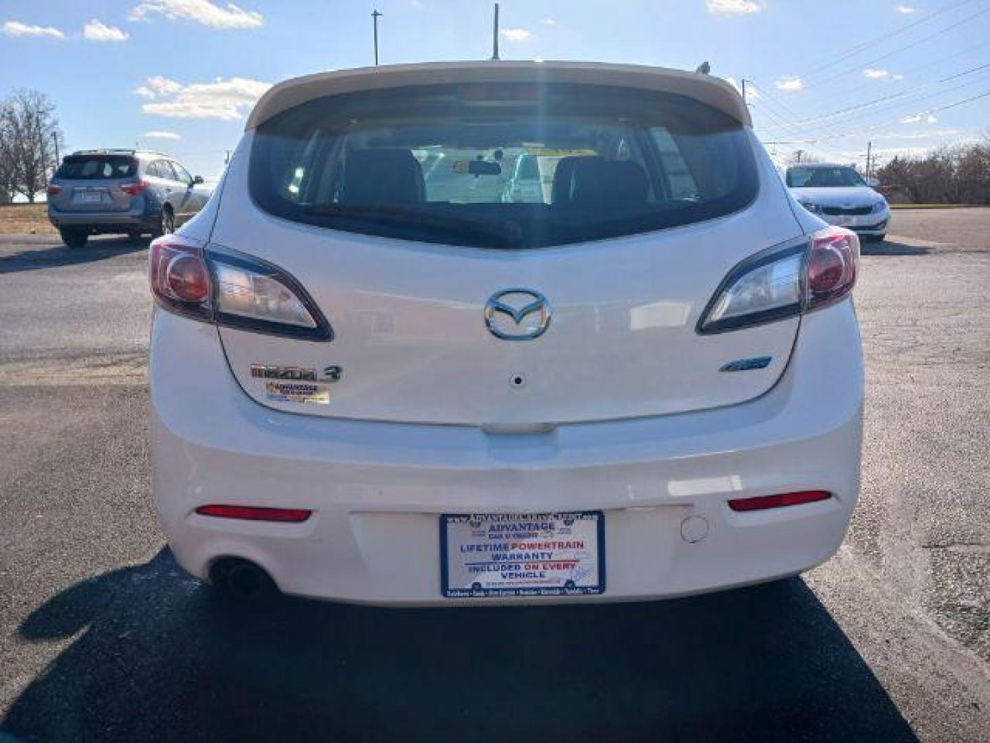 2012 Crystal White Pearl Mica Mazda MAZDA3 I Grand Touring 5-Door (JM1BL1M79C1) with an 2.0L L4 DOHC 16V engine, located at 1951 S Dayton Lakeview Rd., New Carlisle, OH, 45344, (937) 908-9800, 39.890999, -84.050255 - Photo#5