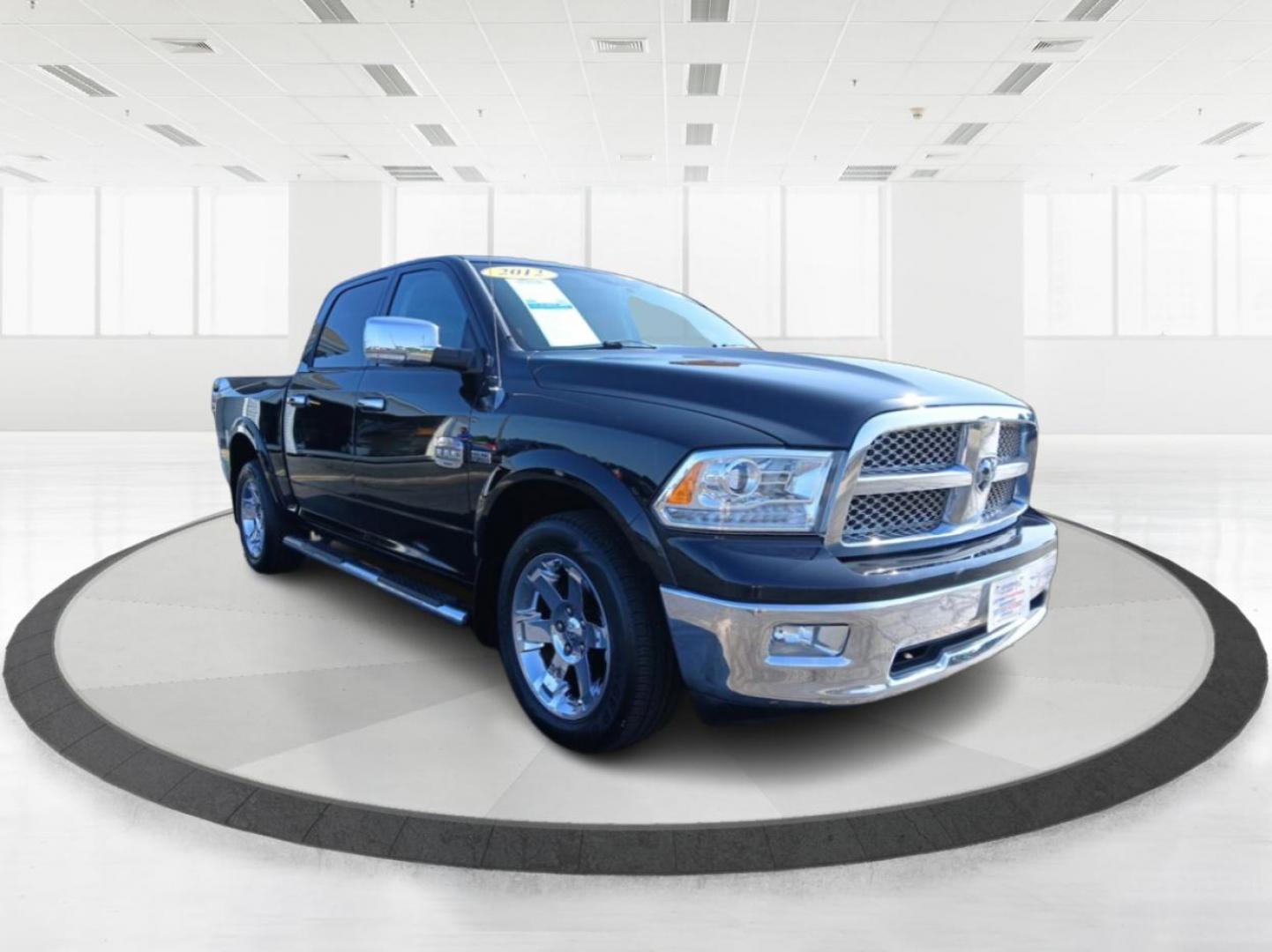 2012 Black RAM 1500 Laramie Longhorn Edition Crew Cab 4WD (1C6RD7PT6CS) with an 5.7L V8 OHV 16V engine, 6-Speed Automatic transmission, located at 401 Woodman Dr, Riverside, OH, 45431, (937) 908-9800, 39.760899, -84.123421 - Photo#0