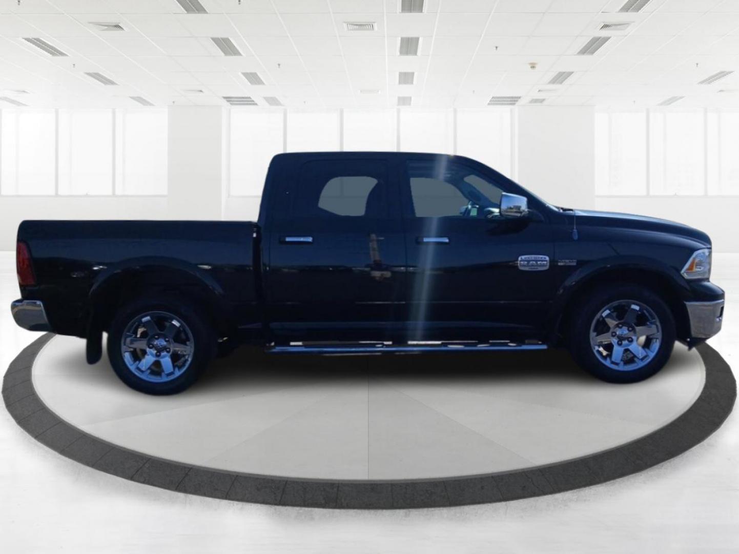 2012 Black RAM 1500 Laramie Longhorn Edition Crew Cab 4WD (1C6RD7PT6CS) with an 5.7L V8 OHV 16V engine, 6-Speed Automatic transmission, located at 401 Woodman Dr, Riverside, OH, 45431, (937) 908-9800, 39.760899, -84.123421 - Photo#1