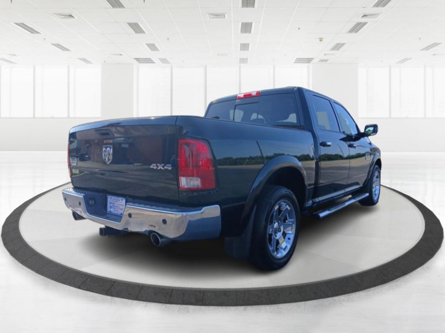 2012 Black RAM 1500 Laramie Longhorn Edition Crew Cab 4WD (1C6RD7PT6CS) with an 5.7L V8 OHV 16V engine, 6-Speed Automatic transmission, located at 401 Woodman Dr, Riverside, OH, 45431, (937) 908-9800, 39.760899, -84.123421 - Photo#2