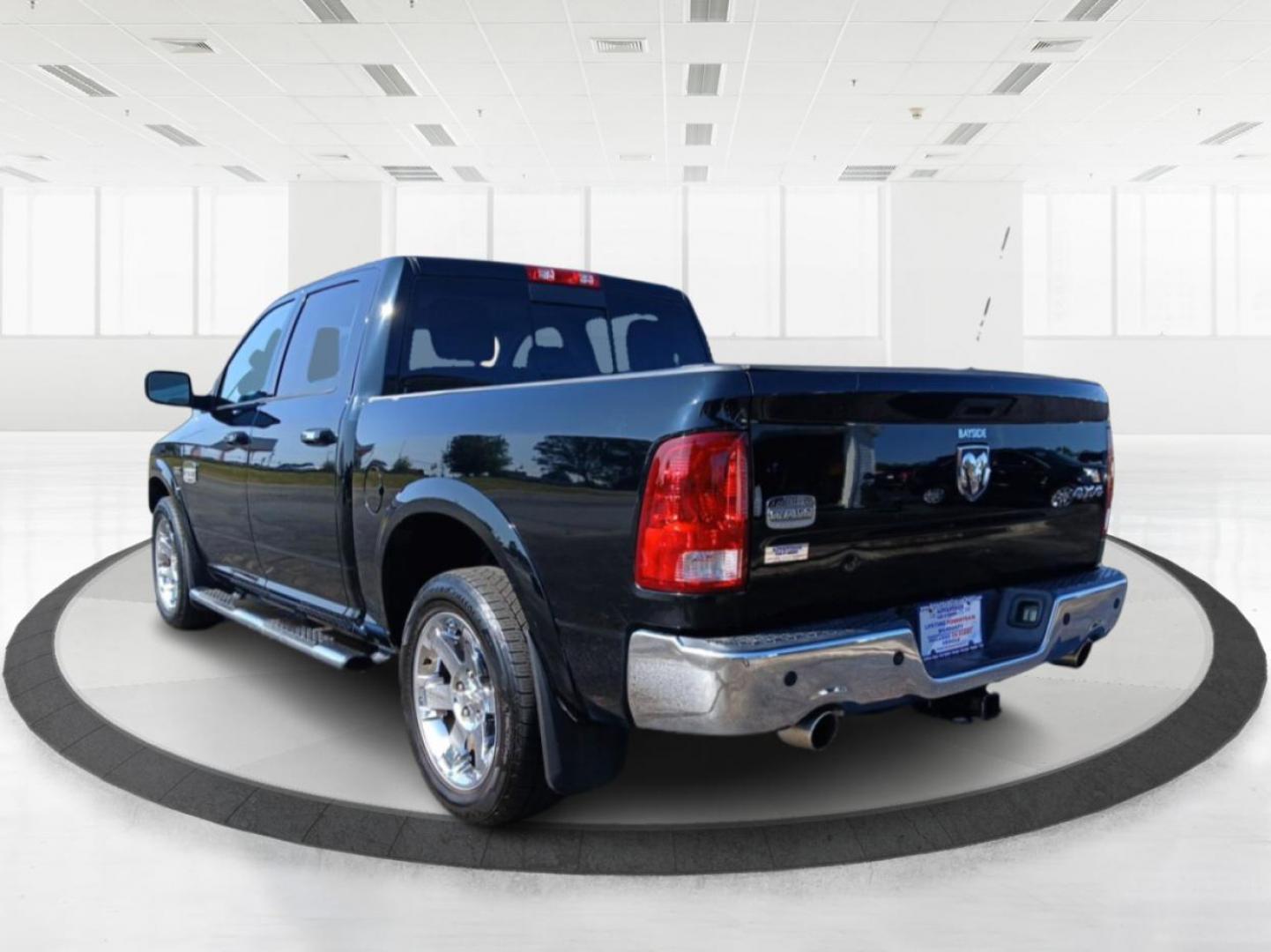 2012 Black RAM 1500 Laramie Longhorn Edition Crew Cab 4WD (1C6RD7PT6CS) with an 5.7L V8 OHV 16V engine, 6-Speed Automatic transmission, located at 401 Woodman Dr, Riverside, OH, 45431, (937) 908-9800, 39.760899, -84.123421 - Photo#4