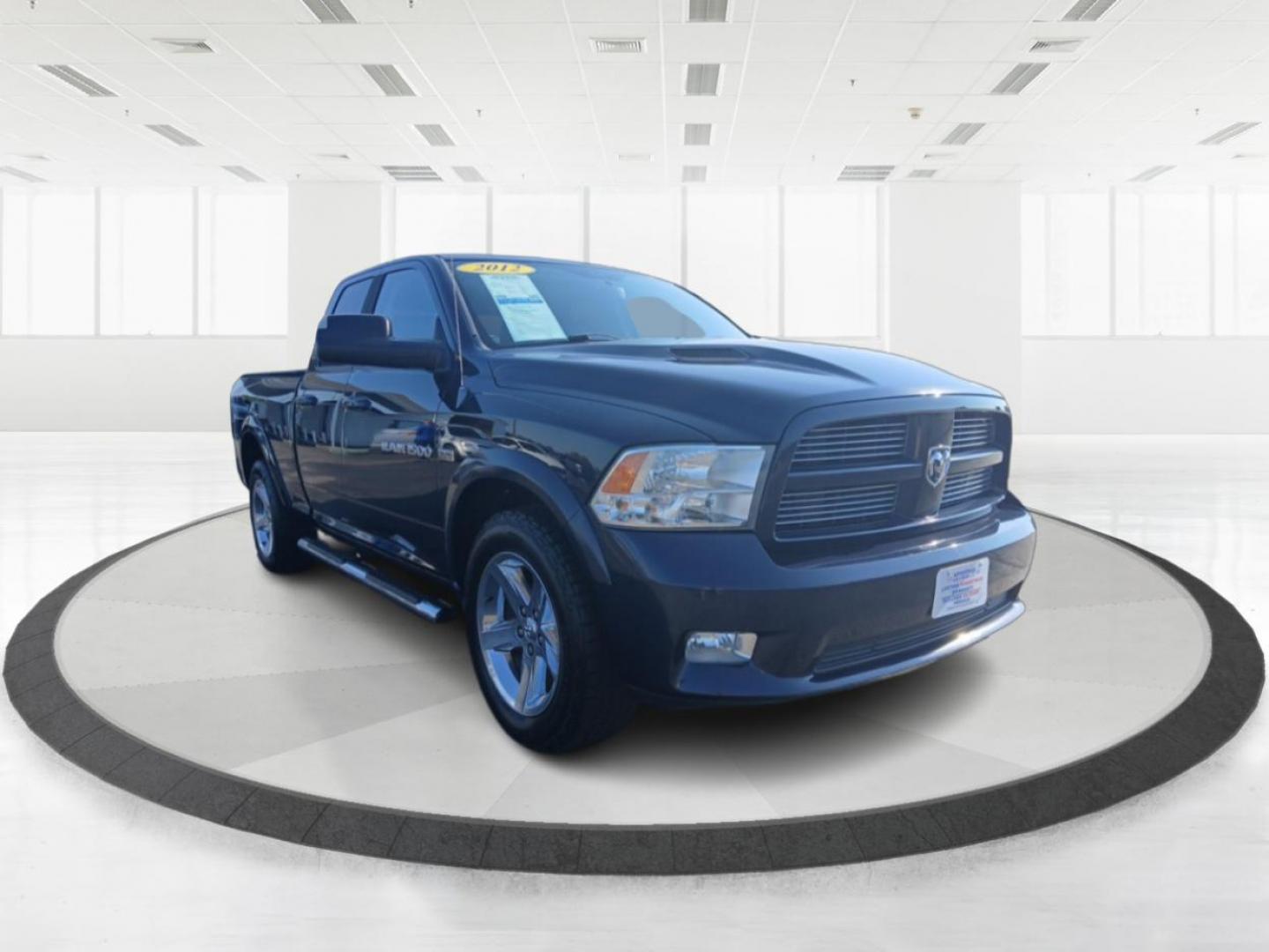 2012 True Blue Pearl RAM 1500 Sport Quad Cab 4WD (1C6RD7HT2CS) with an 5.7L V8 OHV 16V engine, 6-Speed Automatic transmission, located at 880 E. National Road, Vandalia, OH, 45377, (937) 908-9800, 39.891918, -84.183594 - Photo#0