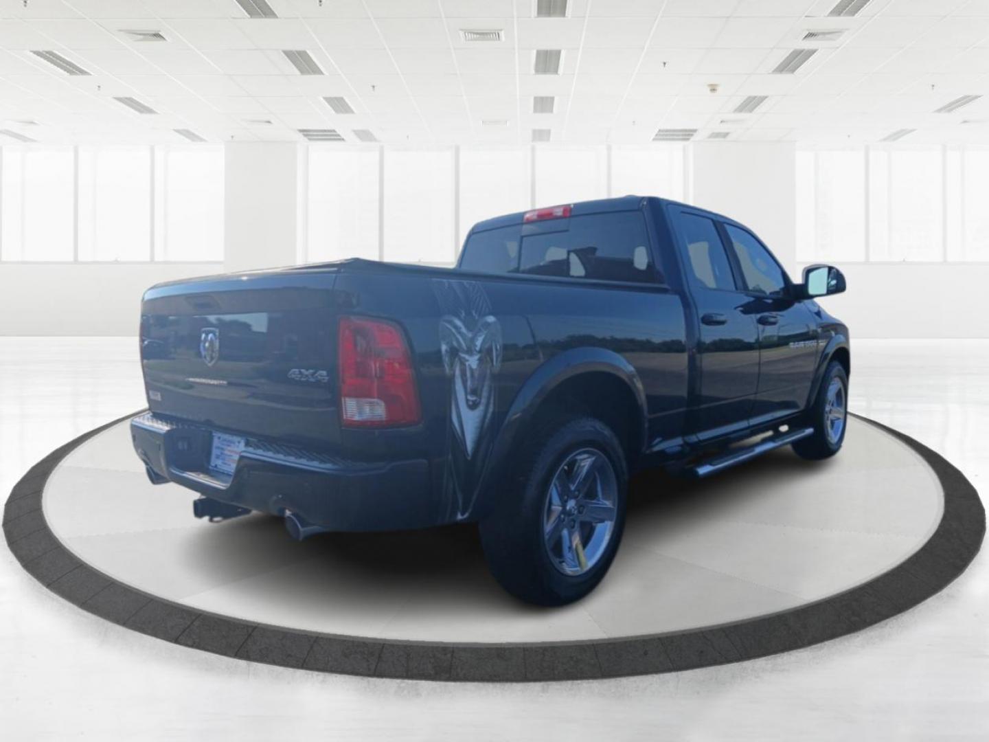 2012 True Blue Pearl RAM 1500 Sport Quad Cab 4WD (1C6RD7HT2CS) with an 5.7L V8 OHV 16V engine, 6-Speed Automatic transmission, located at 880 E. National Road, Vandalia, OH, 45377, (937) 908-9800, 39.891918, -84.183594 - Photo#2