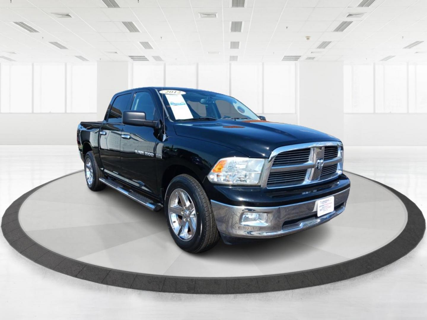 2012 Black RAM 1500 SLT Crew Cab 4WD (1C6RD7LT1CS) with an 5.7L V8 OHV 16V engine, 6-Speed Automatic transmission, located at 1230 East Main St, Xenia, OH, 45385, (937) 908-9800, 39.688026, -83.910172 - Photo#0