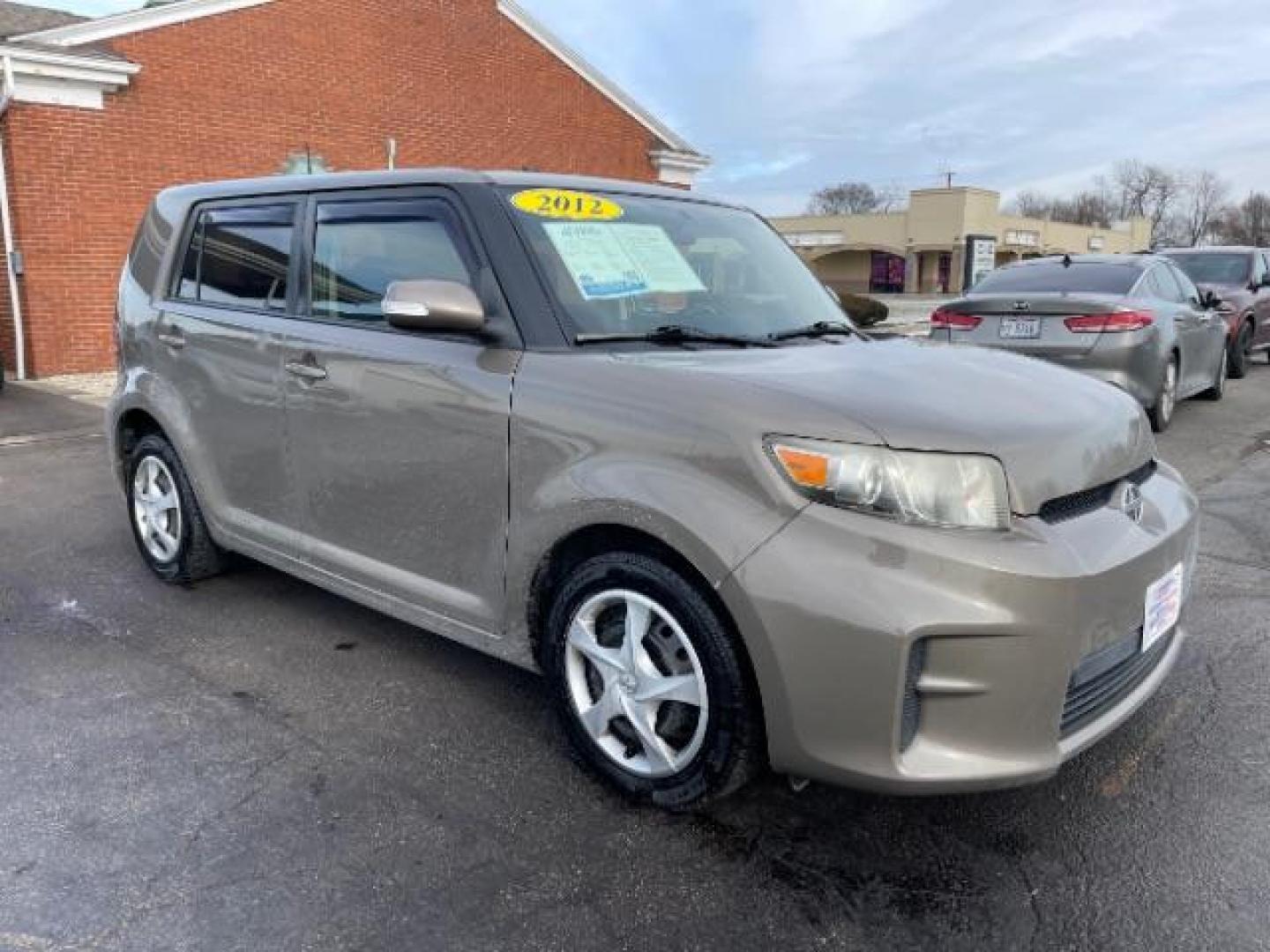 2012 Army Rock Metallic Scion xB 5-Door Wagon 4-Spd AT (JTLZE4FE5CJ) with an 2.4L L4 DOHC 16V engine, 4-Speed Automatic transmission, located at 401 Woodman Dr, Riverside, OH, 45431, (937) 908-9800, 39.760899, -84.123421 - Photo#0