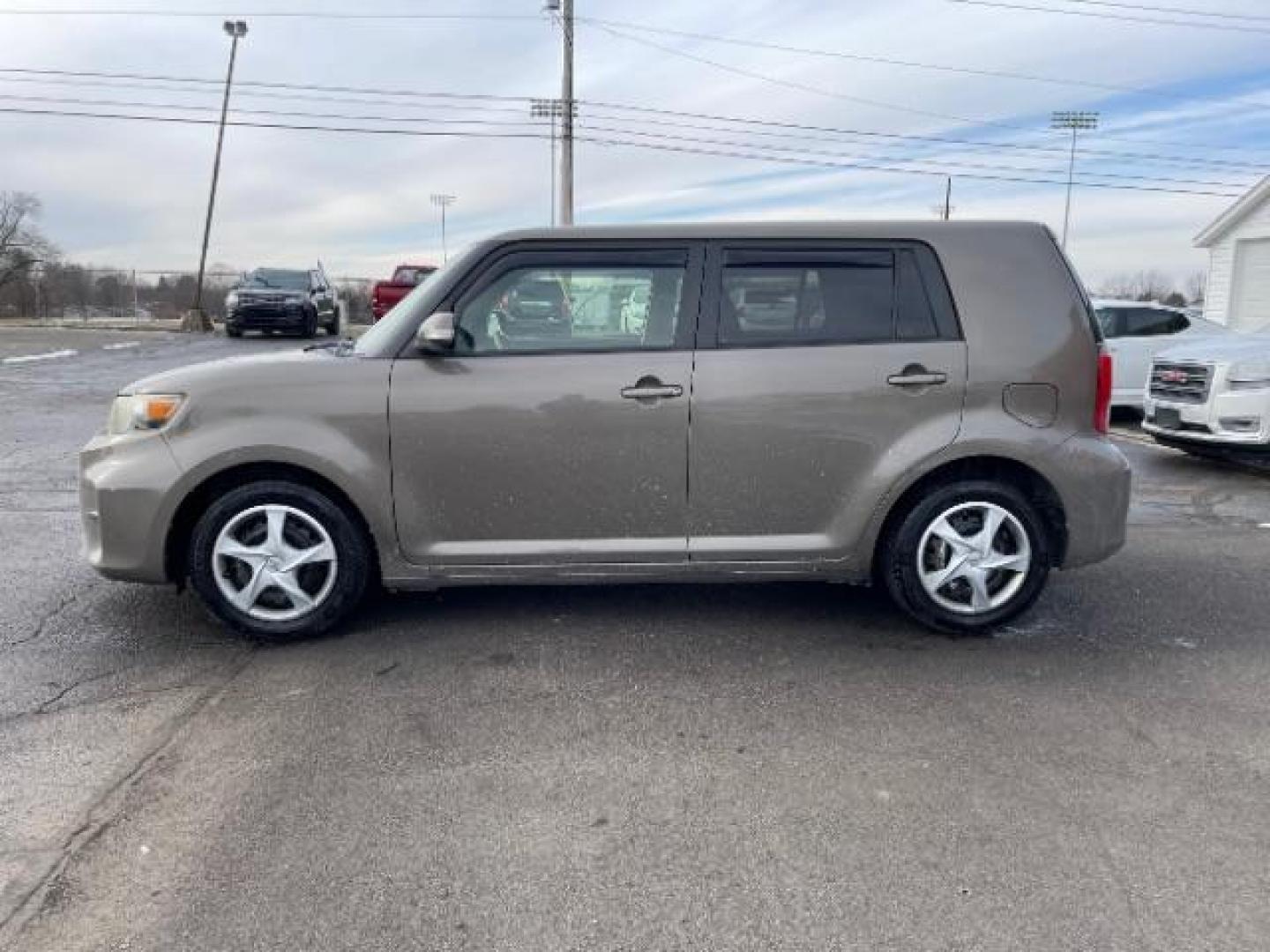 2012 Army Rock Metallic Scion xB 5-Door Wagon 4-Spd AT (JTLZE4FE5CJ) with an 2.4L L4 DOHC 16V engine, 4-Speed Automatic transmission, located at 401 Woodman Dr, Riverside, OH, 45431, (937) 908-9800, 39.760899, -84.123421 - Photo#2