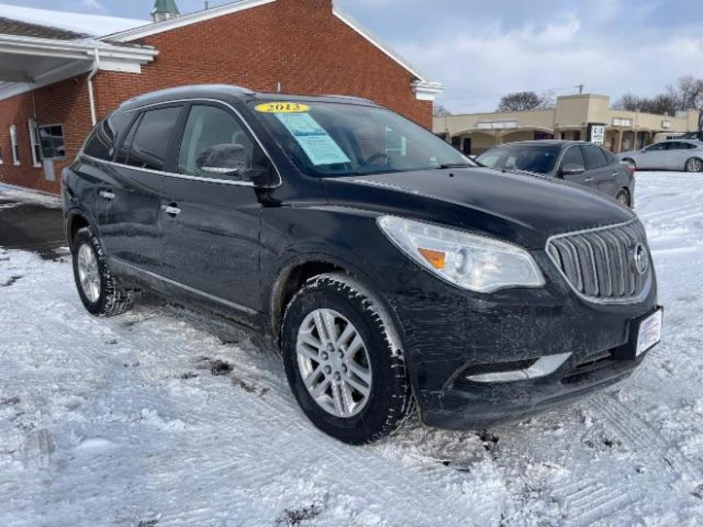 2013 Carbon Black Metallic Buick Enclave Convenience FWD (5GAKRBKD0DJ) with an 3.6L V6 DOHC 24V engine, 6-Speed Automatic Overdrive transmission, located at 1184 Kauffman Ave, Fairborn, OH, 45324, (937) 908-9800, 39.807072, -84.030914 - Photo#0