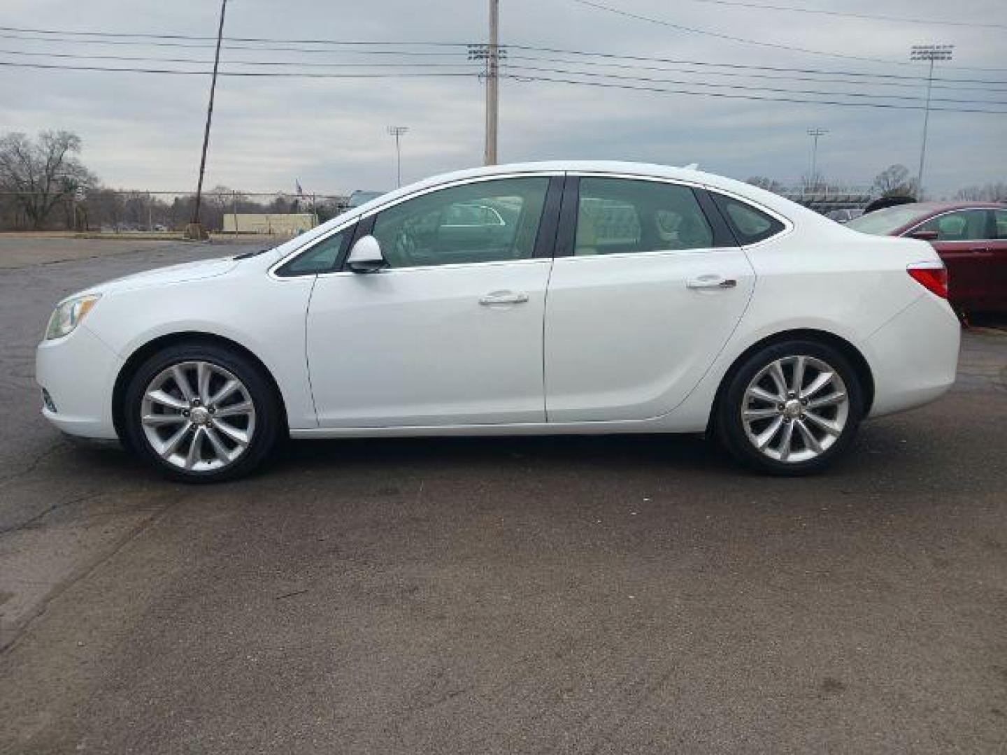 2013 Summit White Buick Verano Base (1G4PP5SKXD4) with an 2.4L L4 DOHC 16V FFV engine, 6-Speed Automatic transmission, located at 4508 South Dixie Dr, Moraine, OH, 45439, (937) 908-9800, 39.689976, -84.218452 - Photo#3