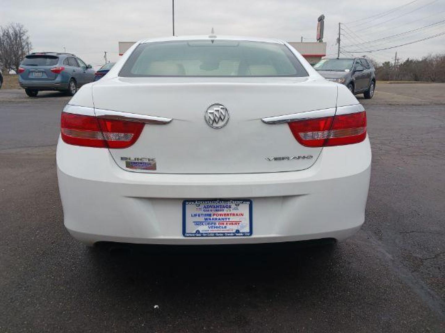 2013 Summit White Buick Verano Base (1G4PP5SKXD4) with an 2.4L L4 DOHC 16V FFV engine, 6-Speed Automatic transmission, located at 4508 South Dixie Dr, Moraine, OH, 45439, (937) 908-9800, 39.689976, -84.218452 - Photo#5