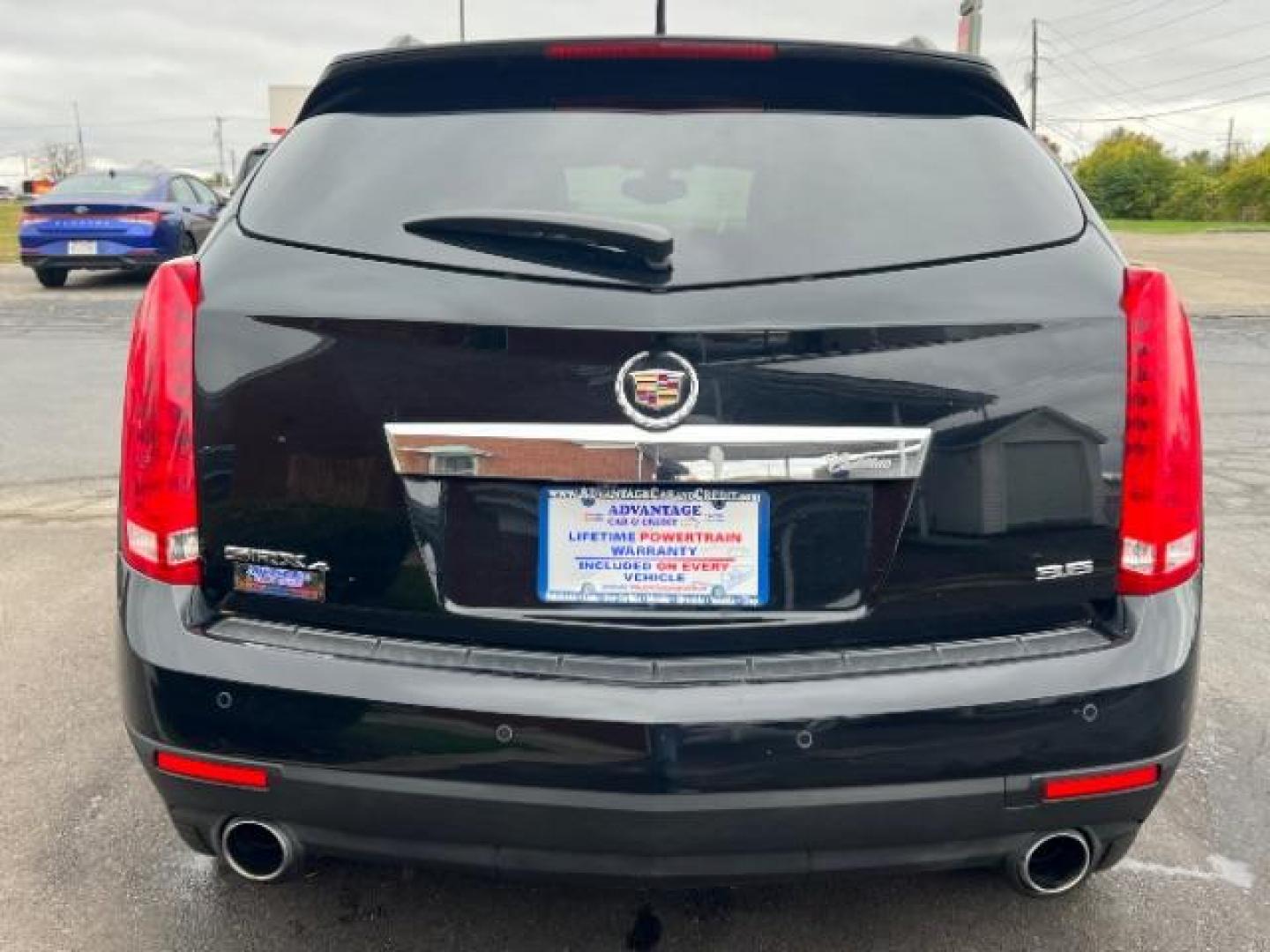 2013 Black Raven Cadillac SRX AWD Luxury Collection (3GYFNGE36DS) with an 3.6L V6 DOHC 24V FFV engine, 6-Speed Automatic transmission, located at 1099 N County Rd 25A , Troy, OH, 45373, (937) 908-9800, 40.057079, -84.212883 - Photo#4