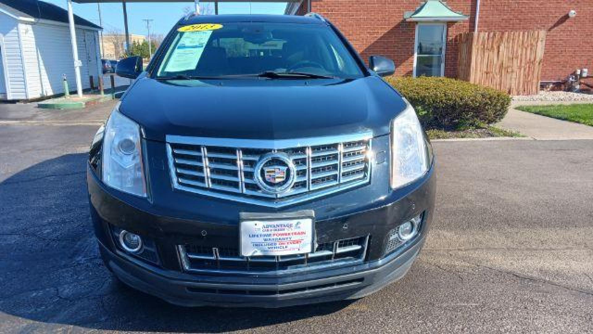 2013 Black Raven Cadillac SRX AWD Performance Collection (3GYFNHE39DS) with an 3.6L V6 DOHC 24V FFV engine, 6-Speed Automatic transmission, located at 1184 Kauffman Ave, Fairborn, OH, 45324, (937) 908-9800, 39.807072, -84.030914 - Photo#1