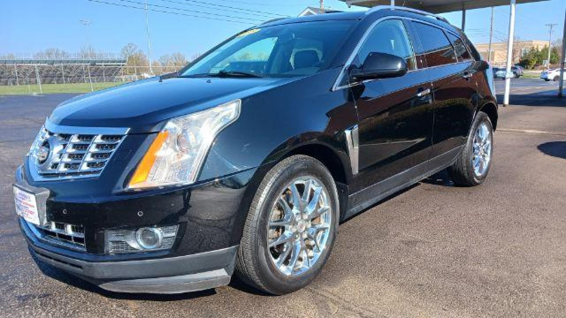 2013 Black Raven Cadillac SRX AWD Performance Collection (3GYFNHE39DS) with an 3.6L V6 DOHC 24V FFV engine, 6-Speed Automatic transmission, located at 1184 Kauffman Ave, Fairborn, OH, 45324, (937) 908-9800, 39.807072, -84.030914 - Photo#3