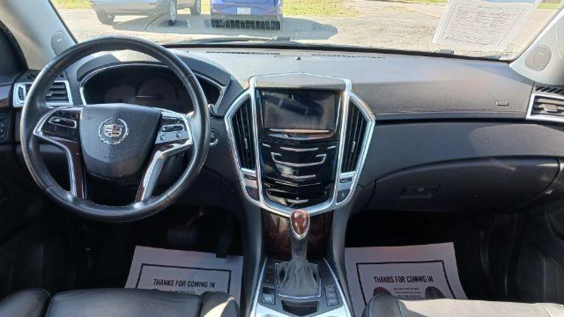 2013 Black Raven Cadillac SRX AWD Performance Collection (3GYFNHE39DS) with an 3.6L V6 DOHC 24V FFV engine, 6-Speed Automatic transmission, located at 1184 Kauffman Ave, Fairborn, OH, 45324, (937) 908-9800, 39.807072, -84.030914 - Photo#7