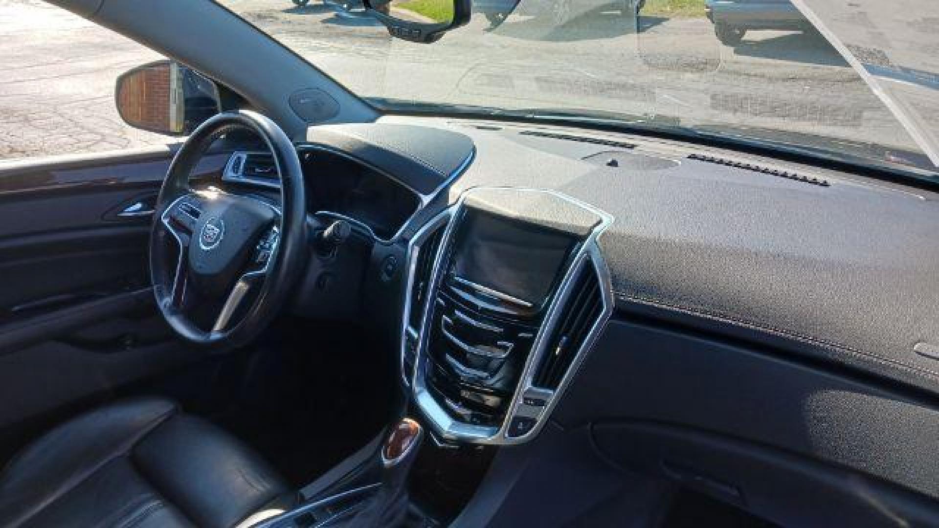 2013 Black Raven Cadillac SRX AWD Performance Collection (3GYFNHE39DS) with an 3.6L V6 DOHC 24V FFV engine, 6-Speed Automatic transmission, located at 1184 Kauffman Ave, Fairborn, OH, 45324, (937) 908-9800, 39.807072, -84.030914 - Photo#8