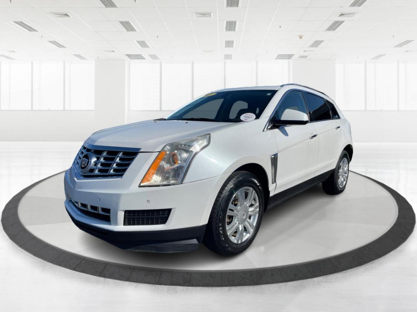 2013 White Cadillac SRX Luxury Collection (3GYFNCE32DS) with an 3.6L V6 DOHC 24V FFV engine, 6-Speed Automatic transmission, located at 880 E. National Road, Vandalia, OH, 45377, (937) 908-9800, 39.891918, -84.183594 - Photo#7