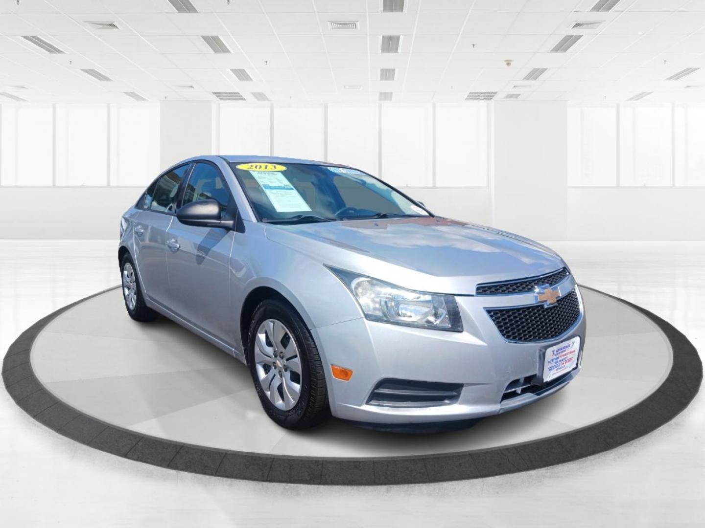 2013 Champagne Silver Metallic Chevrolet Cruze LS Auto (1G1PA5SH8D7) with an 1.8L L4 DOHC 16V FFV engine, 6-Speed Automatic transmission, located at 1099 N County Rd 25A , Troy, OH, 45373, (937) 908-9800, 40.057079, -84.212883 - Photo#0