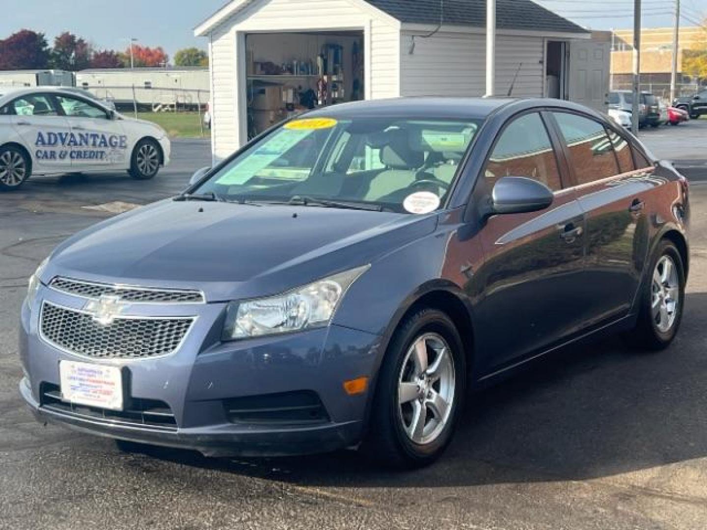 2013 Blue Topaz Metallic Chevrolet Cruze 1LT Auto (1G1PC5SB1D7) with an 1.4L L4 DOHC 16V TURBO engine, 6-Speed Automatic transmission, located at 1230 East Main St, Xenia, OH, 45385, (937) 908-9800, 39.688026, -83.910172 - Photo#2