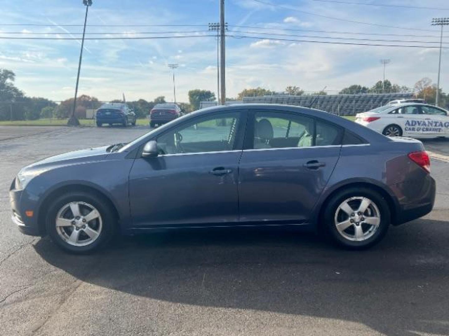 2013 Blue Topaz Metallic Chevrolet Cruze 1LT Auto (1G1PC5SB1D7) with an 1.4L L4 DOHC 16V TURBO engine, 6-Speed Automatic transmission, located at 1230 East Main St, Xenia, OH, 45385, (937) 908-9800, 39.688026, -83.910172 - Photo#3