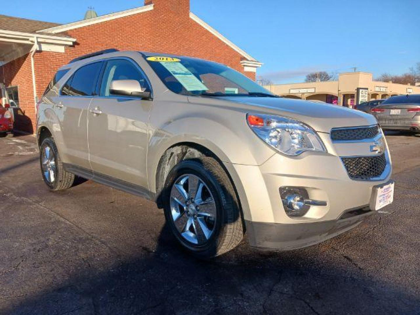 2013 Champagne Silver Metallic Chevrolet Equinox 1LT 2WD (2GNALDEK1D1) with an 2.4L L4 DOHC 16V engine, 6-Speed Automatic transmission, located at 401 Woodman Dr, Riverside, OH, 45431, (937) 908-9800, 39.760899, -84.123421 - Photo#0