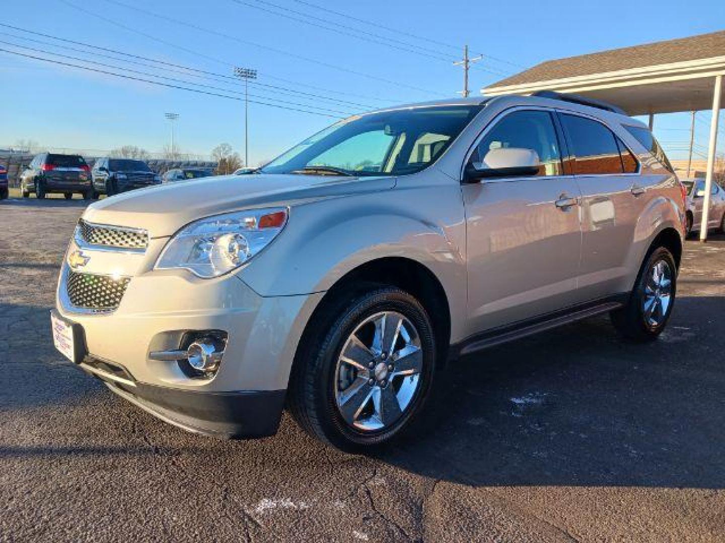 2013 Champagne Silver Metallic Chevrolet Equinox 1LT 2WD (2GNALDEK1D1) with an 2.4L L4 DOHC 16V engine, 6-Speed Automatic transmission, located at 401 Woodman Dr, Riverside, OH, 45431, (937) 908-9800, 39.760899, -84.123421 - Photo#2