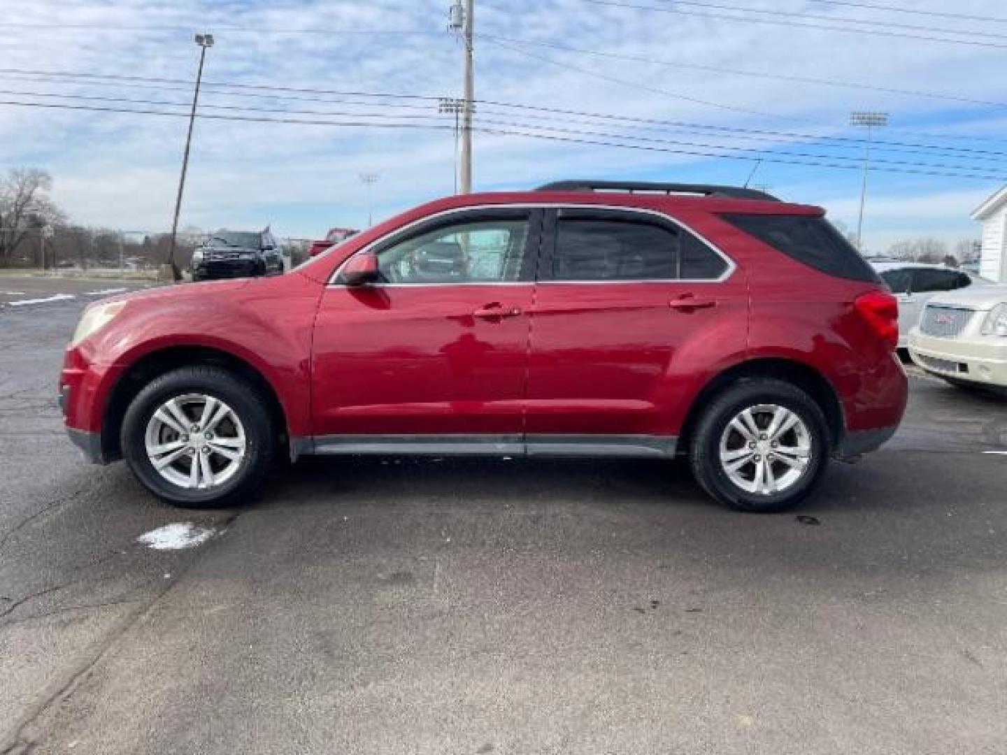 2013 Crystal Red Tintcoat Chevrolet Equinox 1LT AWD (2GNFLEEK4D6) with an 2.4L L4 DOHC 16V engine, 6-Speed Automatic transmission, located at 1184 Kauffman Ave, Fairborn, OH, 45324, (937) 908-9800, 39.807072, -84.030914 - Photo#1