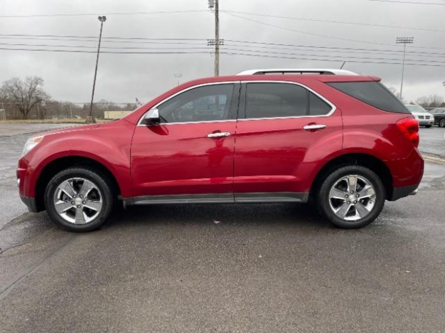 2013 Crystal Red Tintcoat Chevrolet Equinox LTZ AWD (2GNFLGE37D6) with an 3.6L V6 DOHC 24V engine, 6-Speed Automatic transmission, located at 401 Woodman Dr, Riverside, OH, 45431, (937) 908-9800, 39.760899, -84.123421 - Photo#3