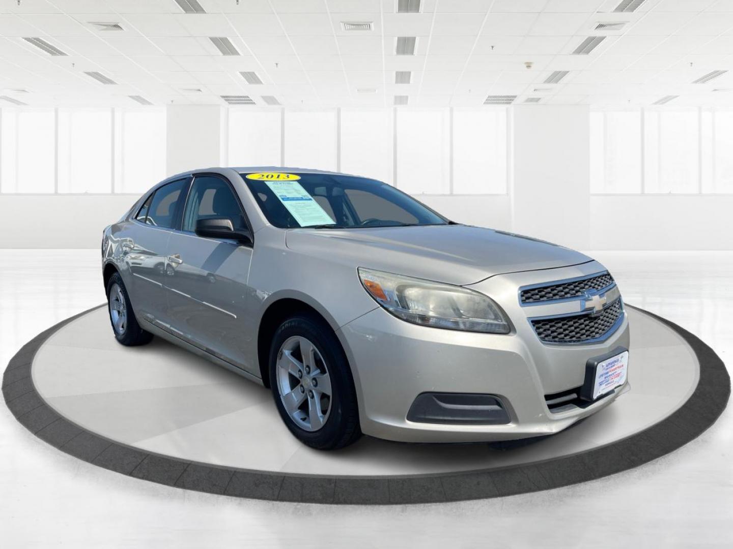 2013 Champagne Silver Metallic Chevrolet Malibu LS (1G11B5SA8DF) with an 2.5L L4 DOHC 16V engine, 6-Speed Automatic transmission, located at 880 E. National Road, Vandalia, OH, 45377, (937) 908-9800, 39.891918, -84.183594 - Photo#0