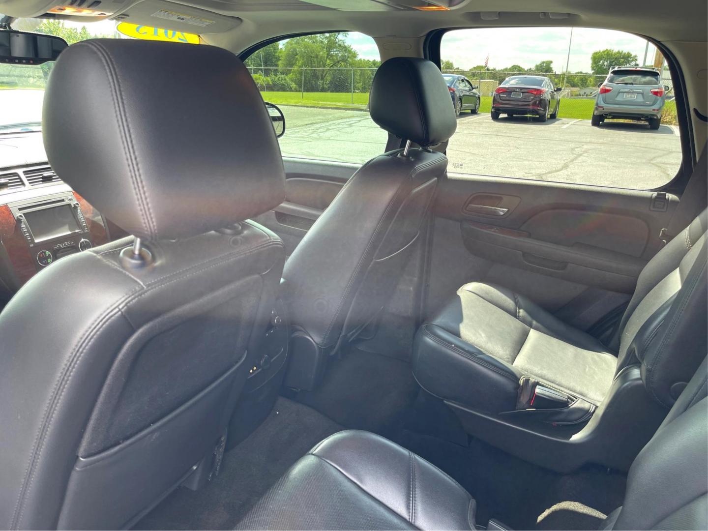 2013 Black Chevrolet Tahoe (1GNSKCE07DR) with an 5.3L V8 OHV 16V FFV engine, 6-Speed Automatic transmission, located at 1184 Kauffman Ave, Fairborn, OH, 45324, (937) 908-9800, 39.807072, -84.030914 - Photo#9