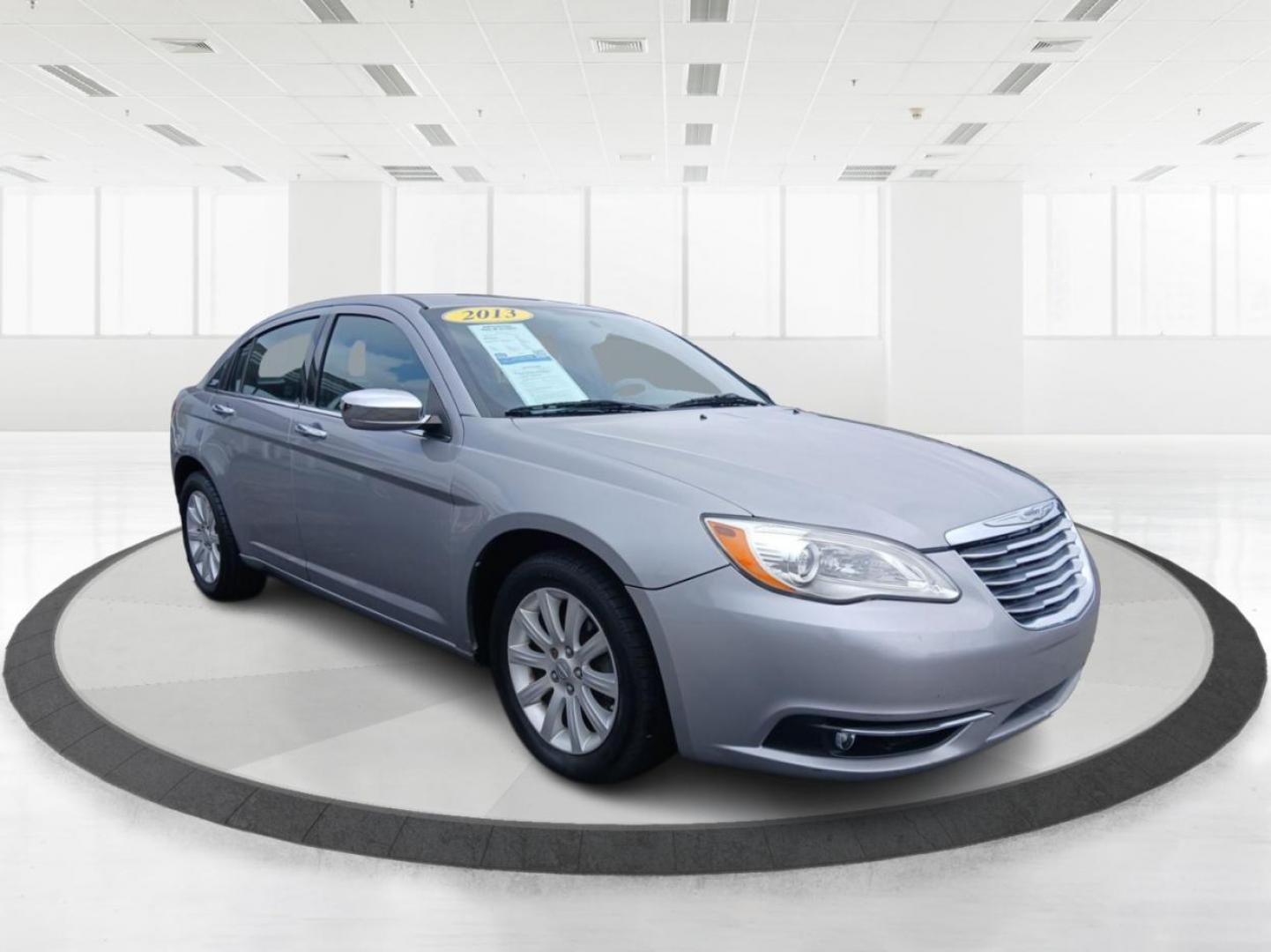 2013 Billet Silver Metallic Chrysler 200 Limited (1C3CCBCG7DN) with an 3.6L V6 DOHC 24V FFV engine, 6-Speed Automatic transmission, located at 401 Woodman Dr, Riverside, OH, 45431, (937) 908-9800, 39.760899, -84.123421 - Photo#0