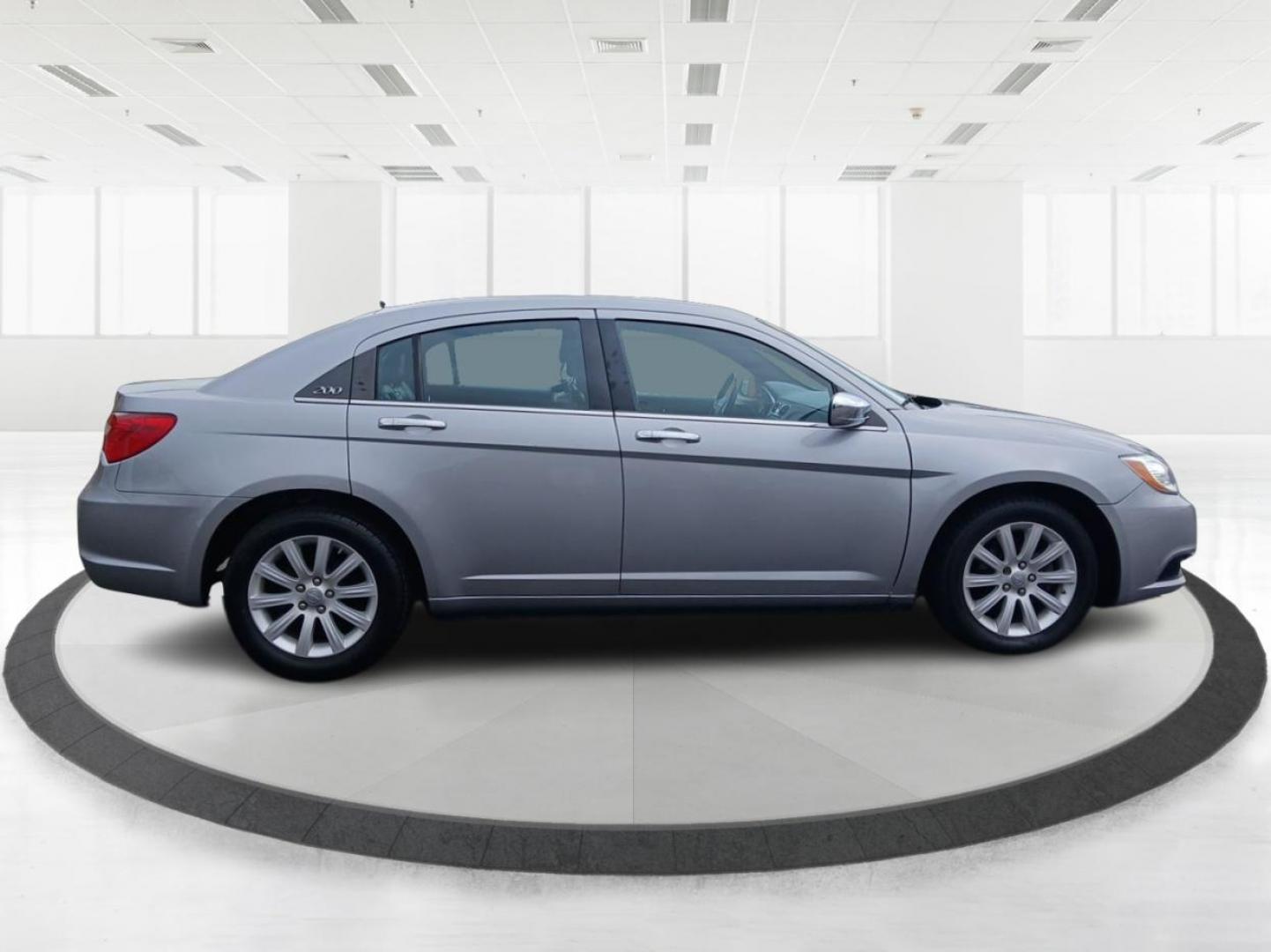 2013 Billet Silver Metallic Chrysler 200 Limited (1C3CCBCG7DN) with an 3.6L V6 DOHC 24V FFV engine, 6-Speed Automatic transmission, located at 401 Woodman Dr, Riverside, OH, 45431, (937) 908-9800, 39.760899, -84.123421 - Photo#1