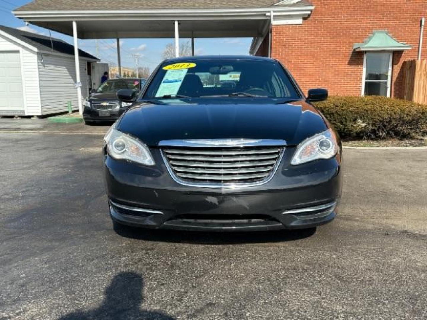 2013 Black Chrysler 200 LX (1C3CCBABXDN) with an 2.4L L4 DOHC 16V engine, 6-Speed Automatic transmission, located at 1184 Kauffman Ave, Fairborn, OH, 45324, (937) 908-9800, 39.807072, -84.030914 - Photo#1