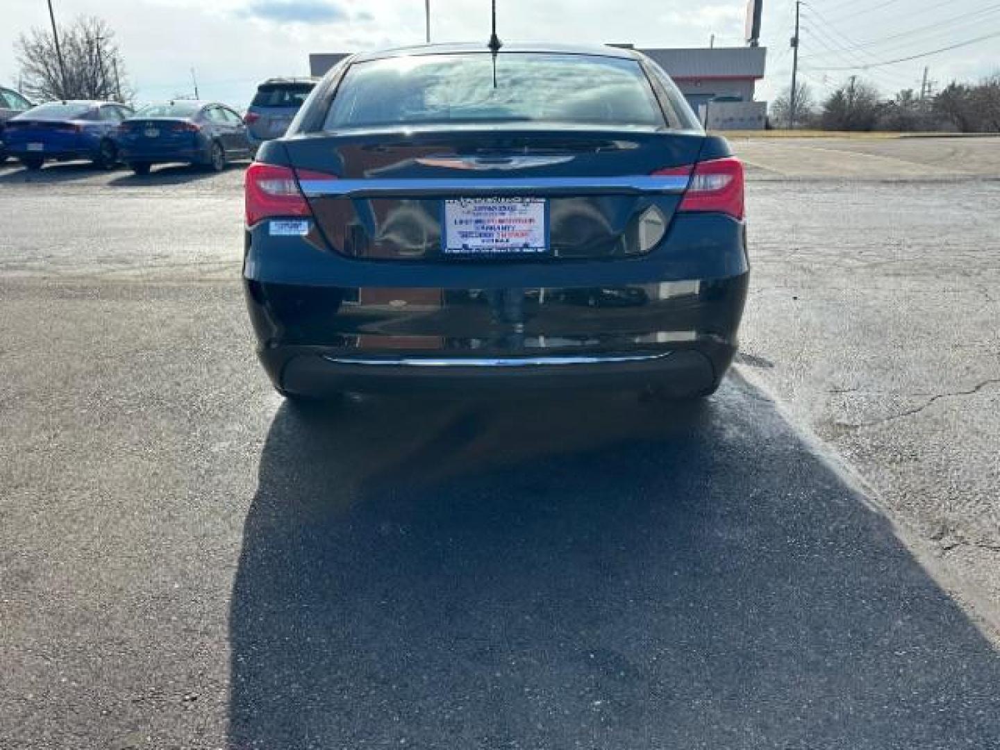 2013 Black Chrysler 200 LX (1C3CCBABXDN) with an 2.4L L4 DOHC 16V engine, 6-Speed Automatic transmission, located at 1184 Kauffman Ave, Fairborn, OH, 45324, (937) 908-9800, 39.807072, -84.030914 - Photo#4