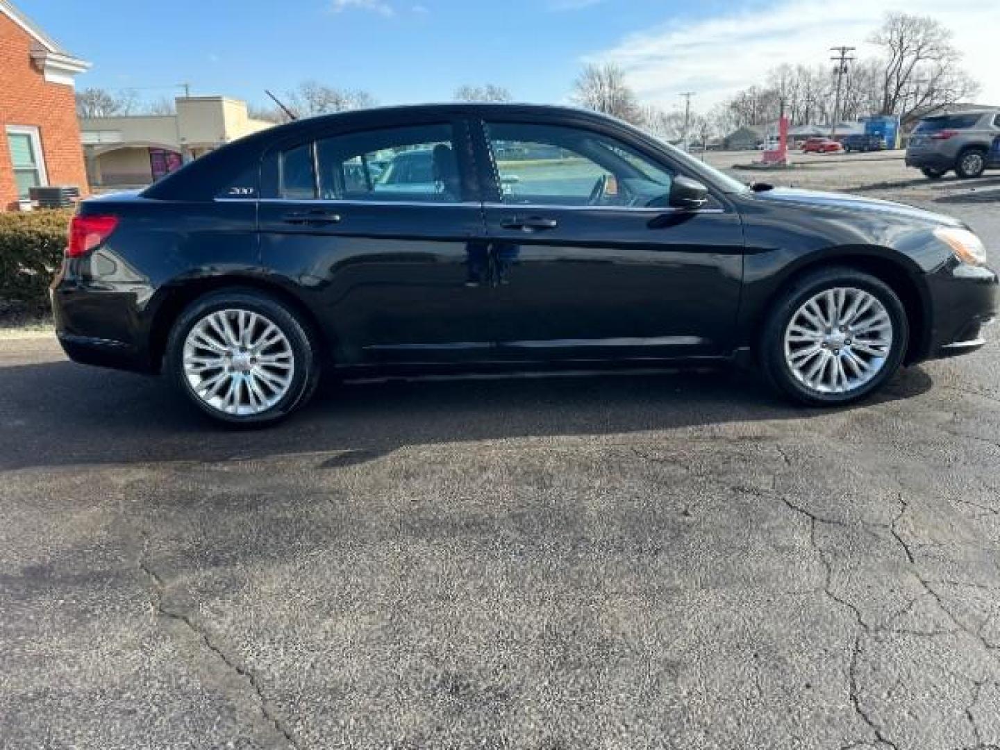 2013 Black Chrysler 200 LX (1C3CCBABXDN) with an 2.4L L4 DOHC 16V engine, 6-Speed Automatic transmission, located at 1184 Kauffman Ave, Fairborn, OH, 45324, (937) 908-9800, 39.807072, -84.030914 - Photo#5