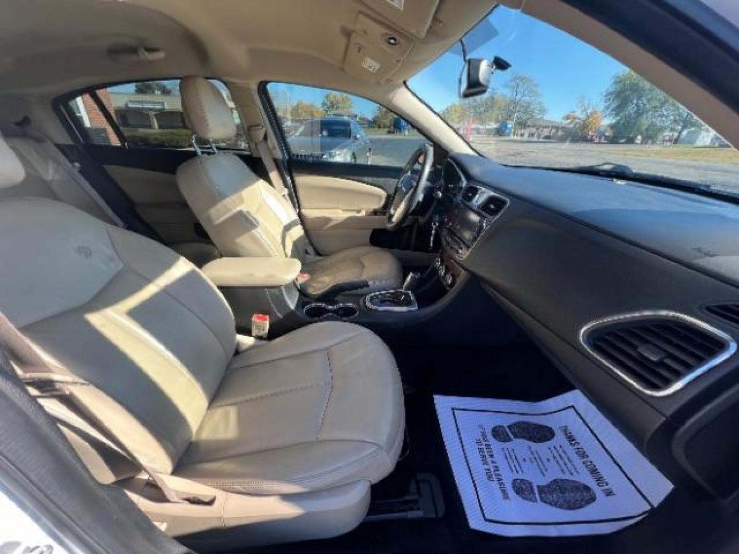 2013 Bright White Chrysler 200 Limited (1C3CCBCG9DN) with an 3.6L V6 DOHC 24V FFV engine, 6-Speed Automatic transmission, located at 1099 N County Rd 25A , Troy, OH, 45373, (937) 908-9800, 40.057079, -84.212883 - Photo#9