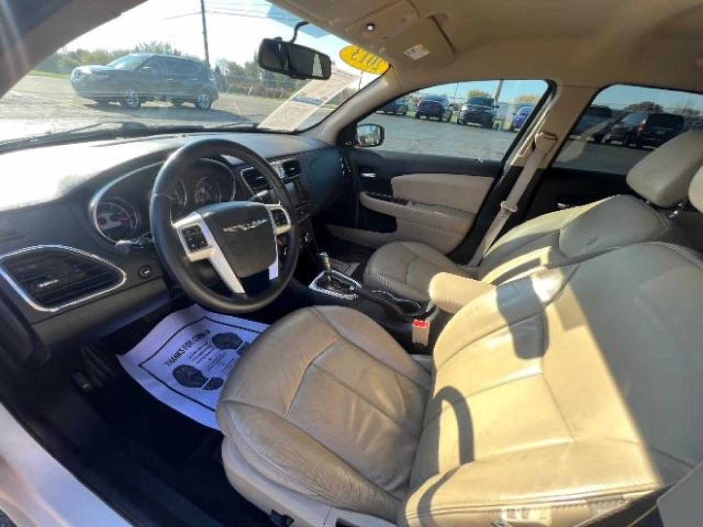 2013 Bright White Chrysler 200 Limited (1C3CCBCG9DN) with an 3.6L V6 DOHC 24V FFV engine, 6-Speed Automatic transmission, located at 1099 N County Rd 25A , Troy, OH, 45373, (937) 908-9800, 40.057079, -84.212883 - Photo#6