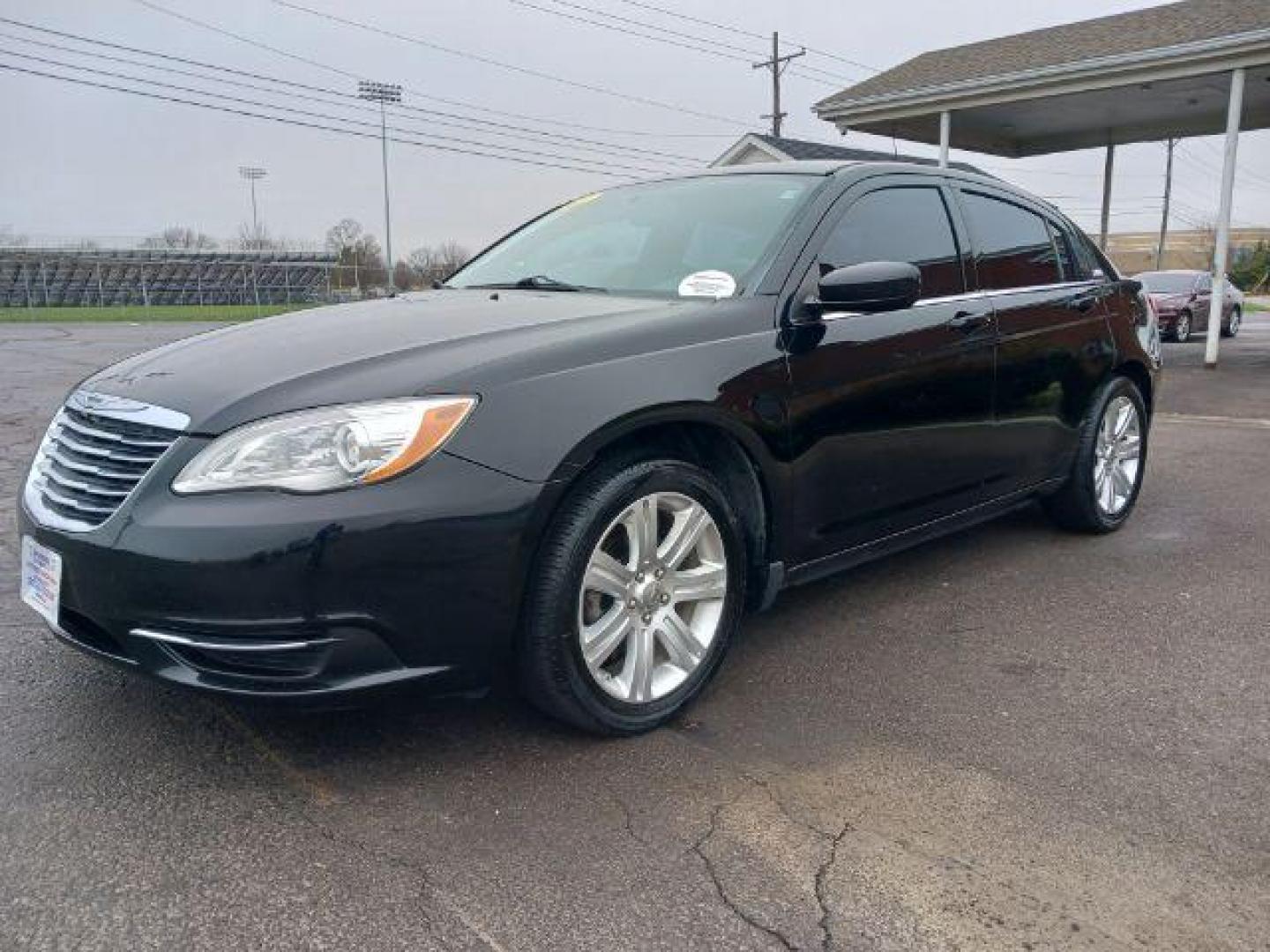 2013 Black Chrysler 200 Touring (1C3CCBBB8DN) with an 2.4L L4 DOHC 16V engine, 6-Speed Automatic transmission, located at 401 Woodman Dr, Riverside, OH, 45431, (937) 908-9800, 39.760899, -84.123421 - Photo#2