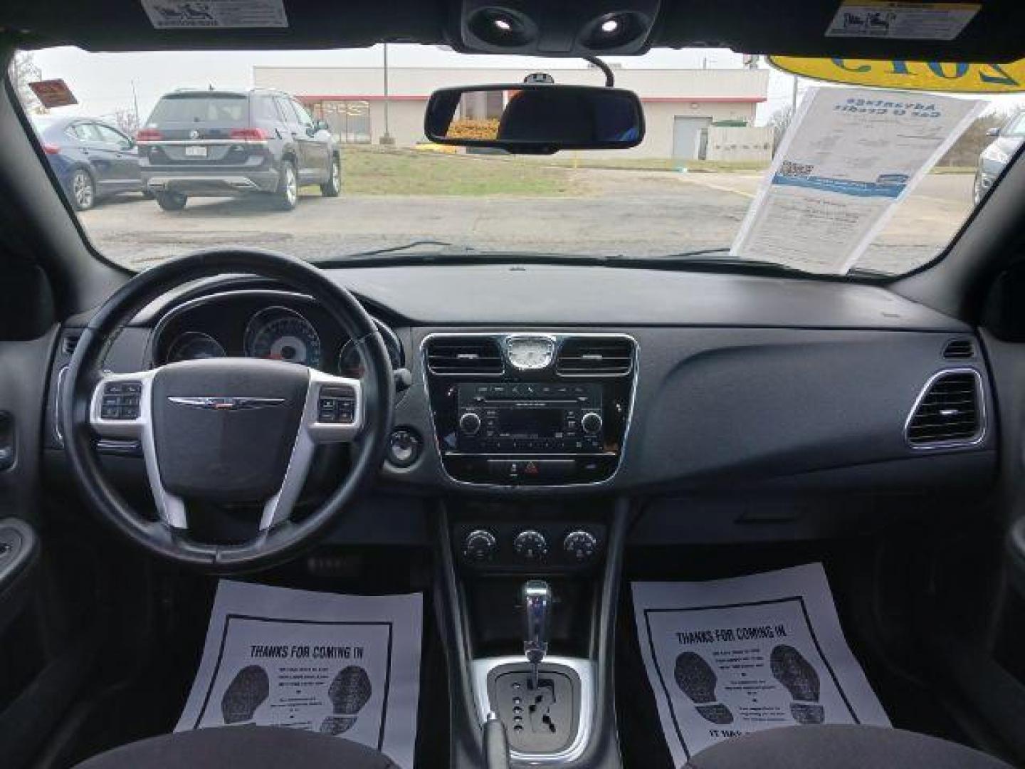 2013 Black Chrysler 200 Touring (1C3CCBBB8DN) with an 2.4L L4 DOHC 16V engine, 6-Speed Automatic transmission, located at 401 Woodman Dr, Riverside, OH, 45431, (937) 908-9800, 39.760899, -84.123421 - Photo#7