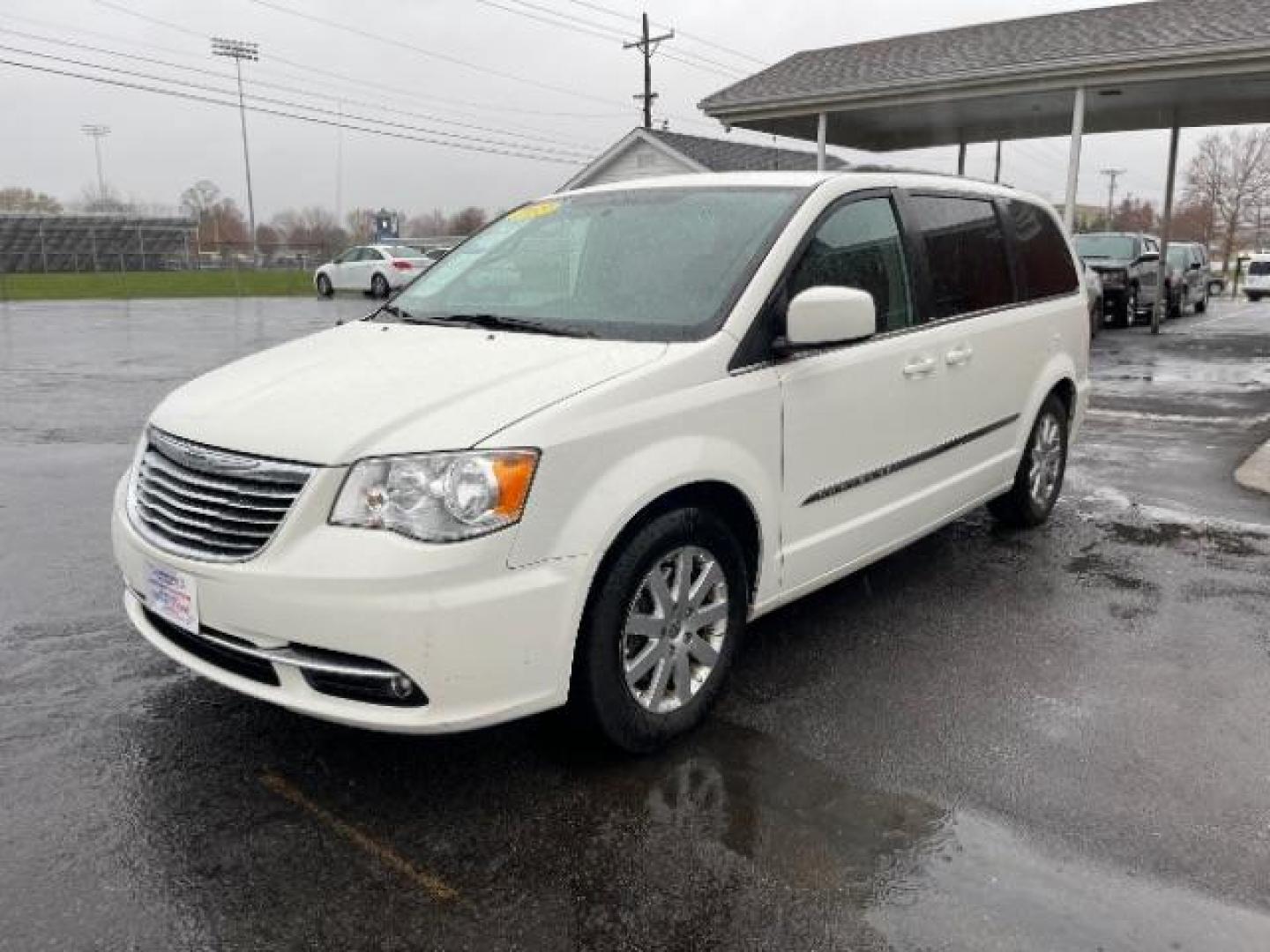 2013 Stone White Chrysler Town and Country Touring (2C4RC1BG7DR) with an 3.6L V6 DOHC 24V engine, 6-Speed Automatic transmission, located at 401 Woodman Dr, Riverside, OH, 45431, (937) 908-9800, 39.760899, -84.123421 - Photo#1