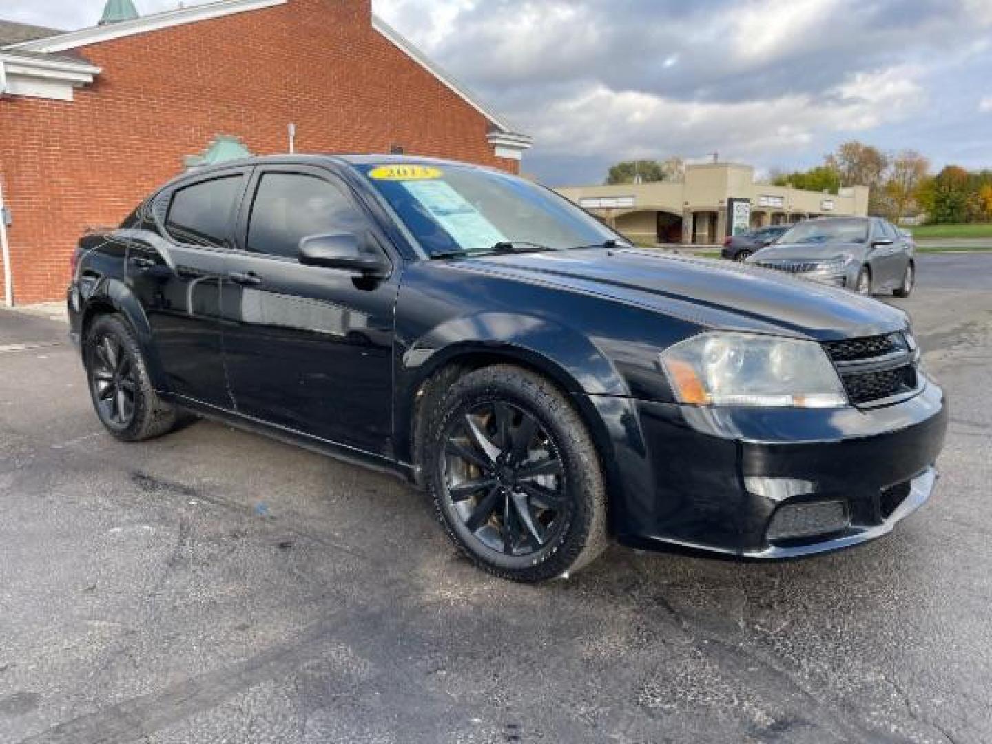 2013 Black Dodge Avenger SE (1C3CDZAG6DN) with an 3.6L V6 DOHC 24V FFV engine, 6-Speed Automatic transmission, located at 1951 S Dayton Lakeview Rd., New Carlisle, OH, 45344, (937) 908-9800, 39.890999, -84.050255 - Photo#0