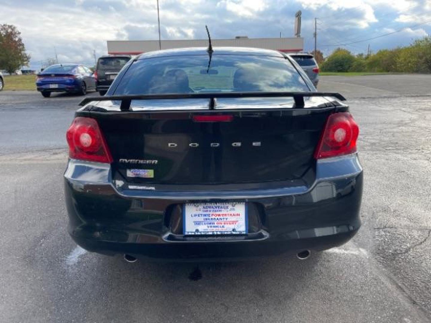 2013 Black Dodge Avenger SE (1C3CDZAG6DN) with an 3.6L V6 DOHC 24V FFV engine, 6-Speed Automatic transmission, located at 1951 S Dayton Lakeview Rd., New Carlisle, OH, 45344, (937) 908-9800, 39.890999, -84.050255 - Photo#4