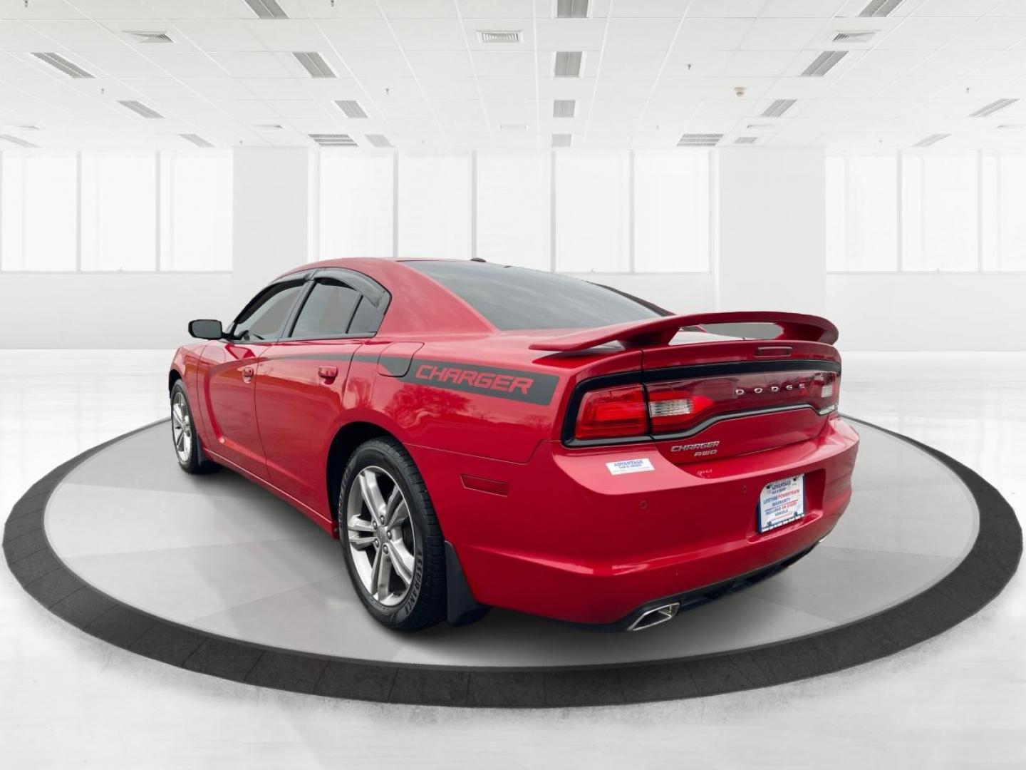 2013 Dodge Charger SXT AWD (2C3CDXJG6DH) with an 3.6L V6 DOHC 24V engine, 5-Speed Automatic transmission, located at 1184 Kauffman Ave, Fairborn, OH, 45324, (937) 908-9800, 39.807072, -84.030914 - 2013 Dodge Charger SXT AWD - Photo#4