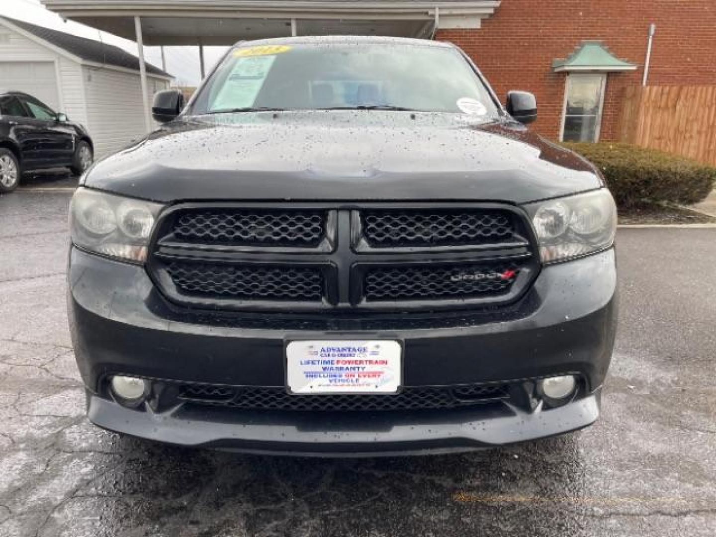 2013 Brilliant Black Crystal Pearl Dodge Durango SXT AWD (1C4RDJAG2DC) with an 3.6L V6 DOHC 24V engine, 5-Speed Automatic transmission, located at 1099 N County Rd 25A , Troy, OH, 45373, (937) 908-9800, 40.057079, -84.212883 - Photo#3