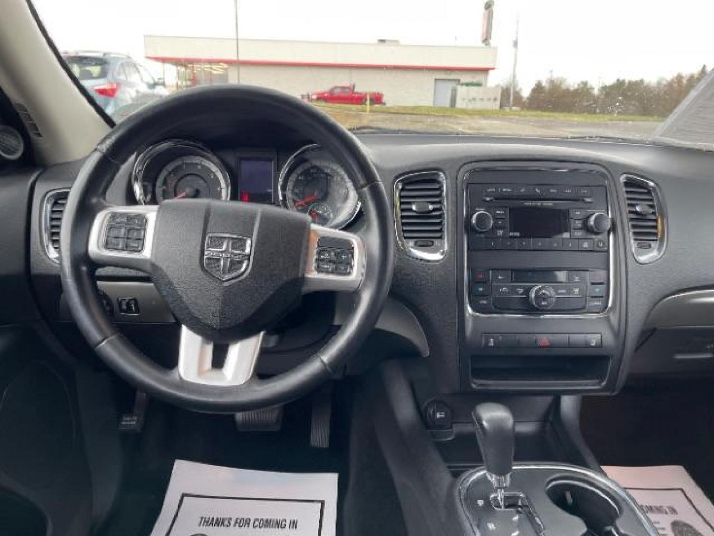 2013 Brilliant Black Crystal Pearl Dodge Durango SXT AWD (1C4RDJAG2DC) with an 3.6L V6 DOHC 24V engine, 5-Speed Automatic transmission, located at 1099 N County Rd 25A , Troy, OH, 45373, (937) 908-9800, 40.057079, -84.212883 - Photo#7