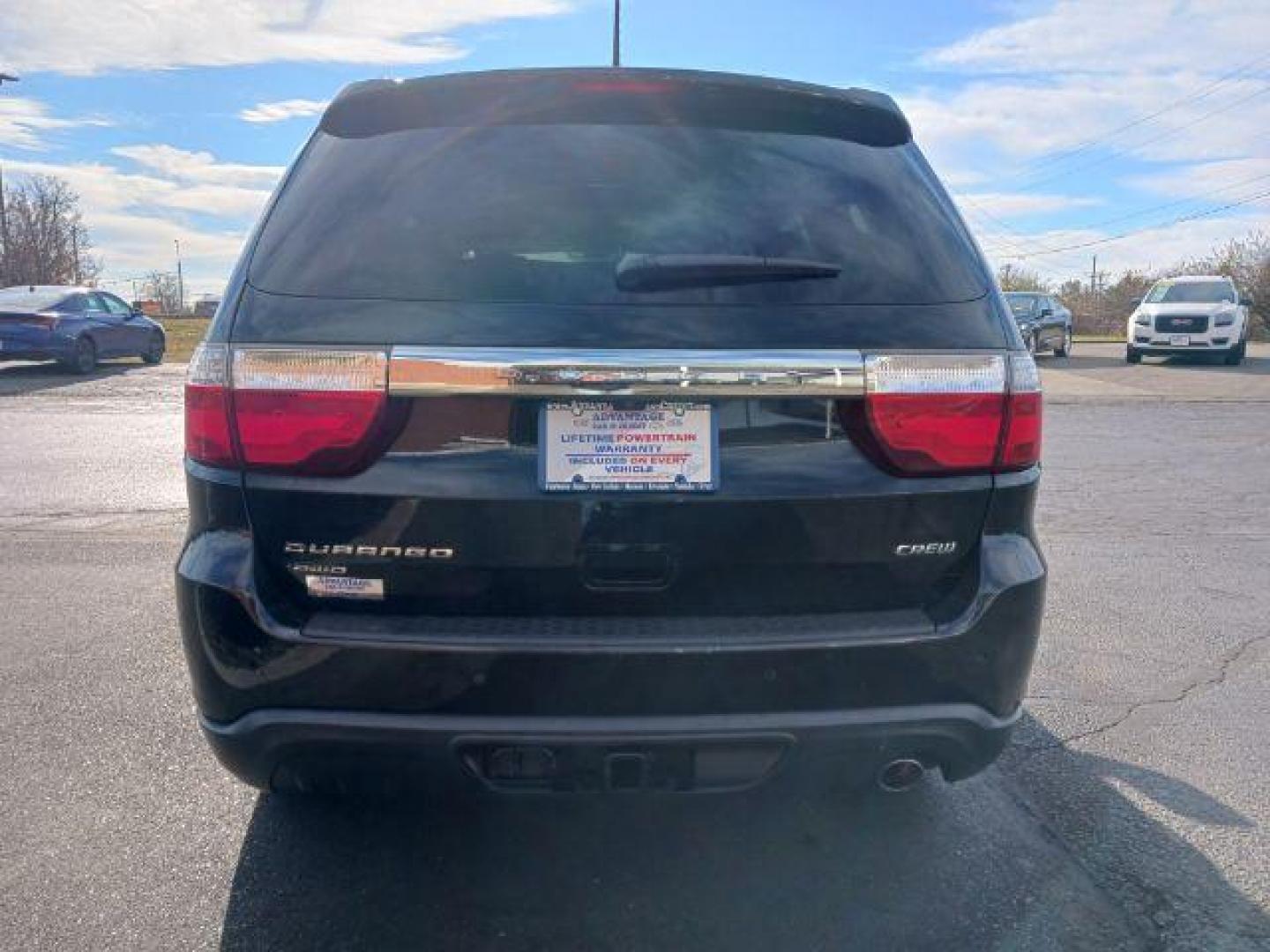 2013 Brilliant Black Crystal Pearl Dodge Durango Crew AWD (1C4RDJDG9DC) with an 3.6L V6 DOHC 24V engine, 5-Speed Automatic transmission, located at 1230 East Main St, Xenia, OH, 45385, (937) 908-9800, 39.688026, -83.910172 - Photo#5