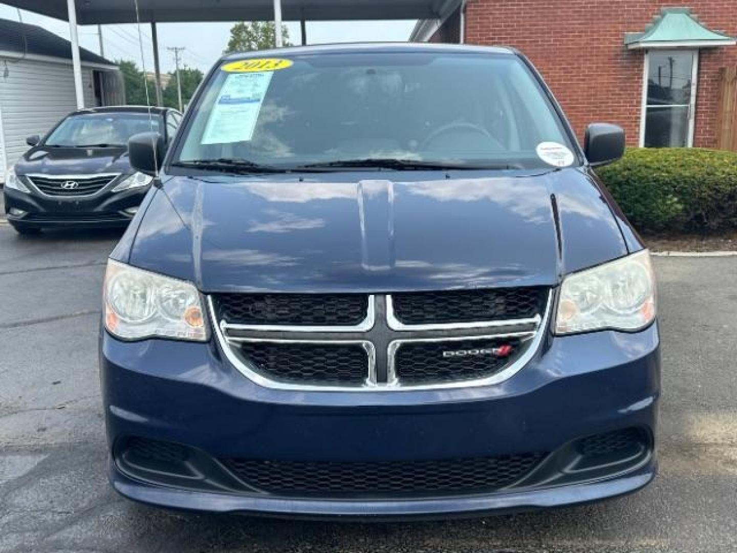 2013 Blue Streak Pearl Dodge Grand Caravan SE (2C4RDGBG1DR) with an 3.6L V6 DOHC 24V engine, 6-Speed Automatic transmission, located at 401 Woodman Dr, Riverside, OH, 45431, (937) 908-9800, 39.760899, -84.123421 - Photo#1